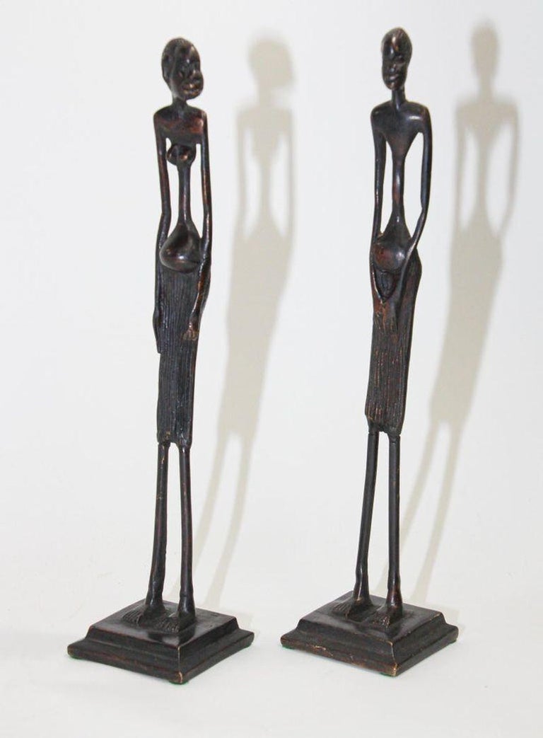Cast Modernist Bronze African Sculptures of a Couple, Tribal Art Etruscan Style For Sale