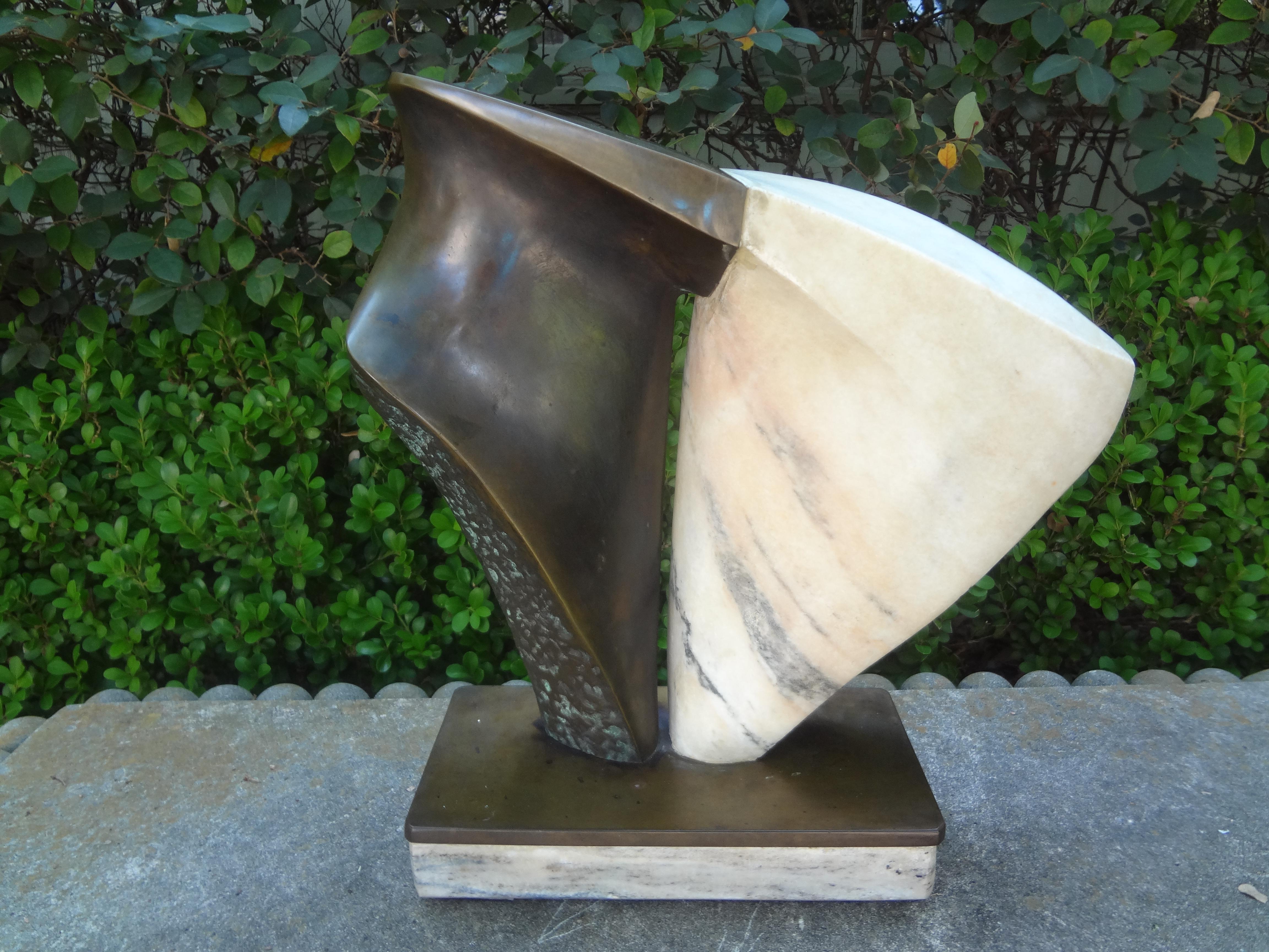 Modernist Bronze And Marble Abstract Sculpture.
Well executed and well cast 20th century bronze and marble modernist abstract sculpture.

Stan Wysocki, born in 1949 in Elk, is a polish sculptor. The artist studied at the Beaux-Arts academy in Poznan