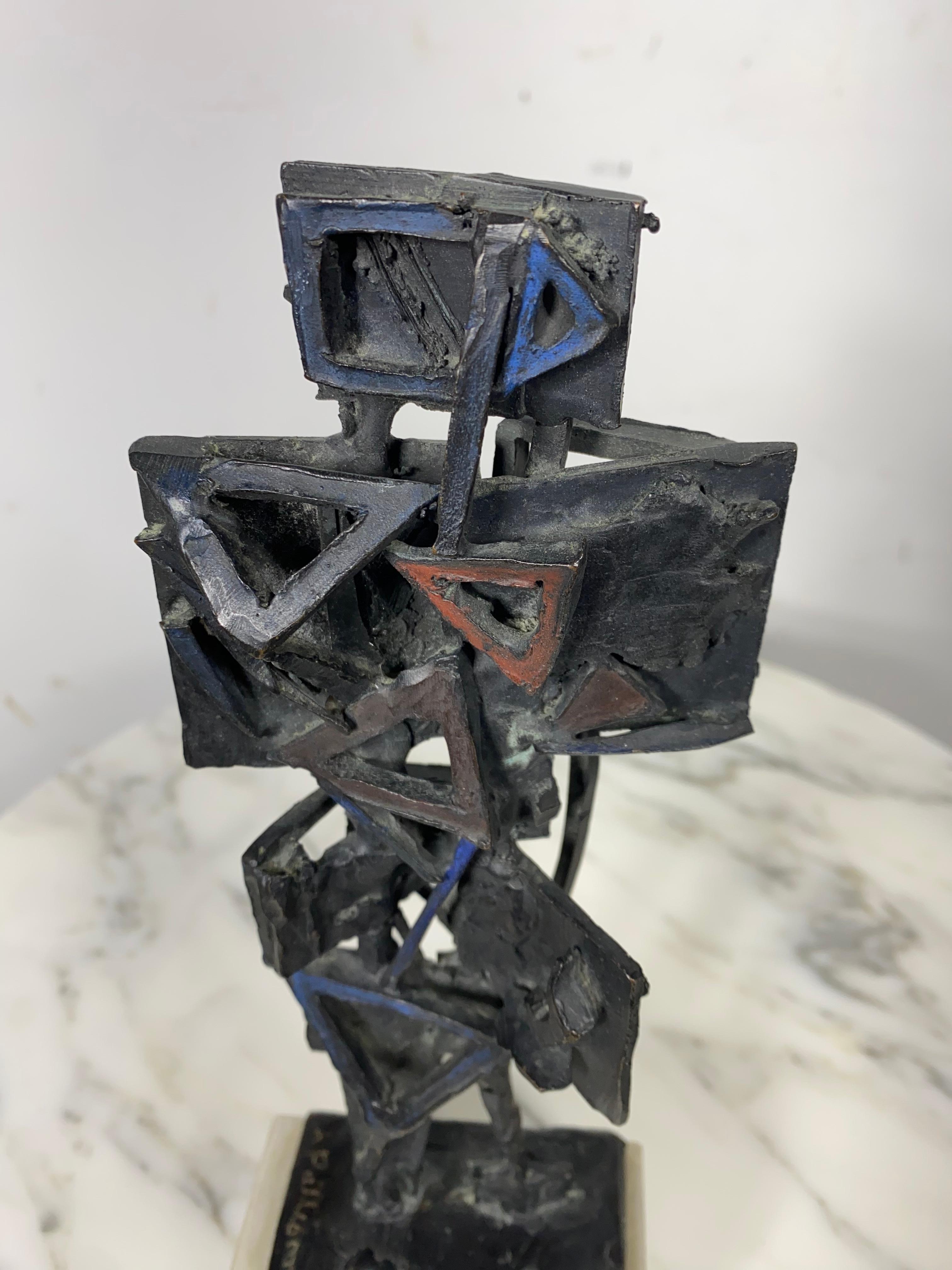 An abstract modernist bronze sculpture by Abbot Pattison depicting  Picasso like figure signed at the base of the sculpture 