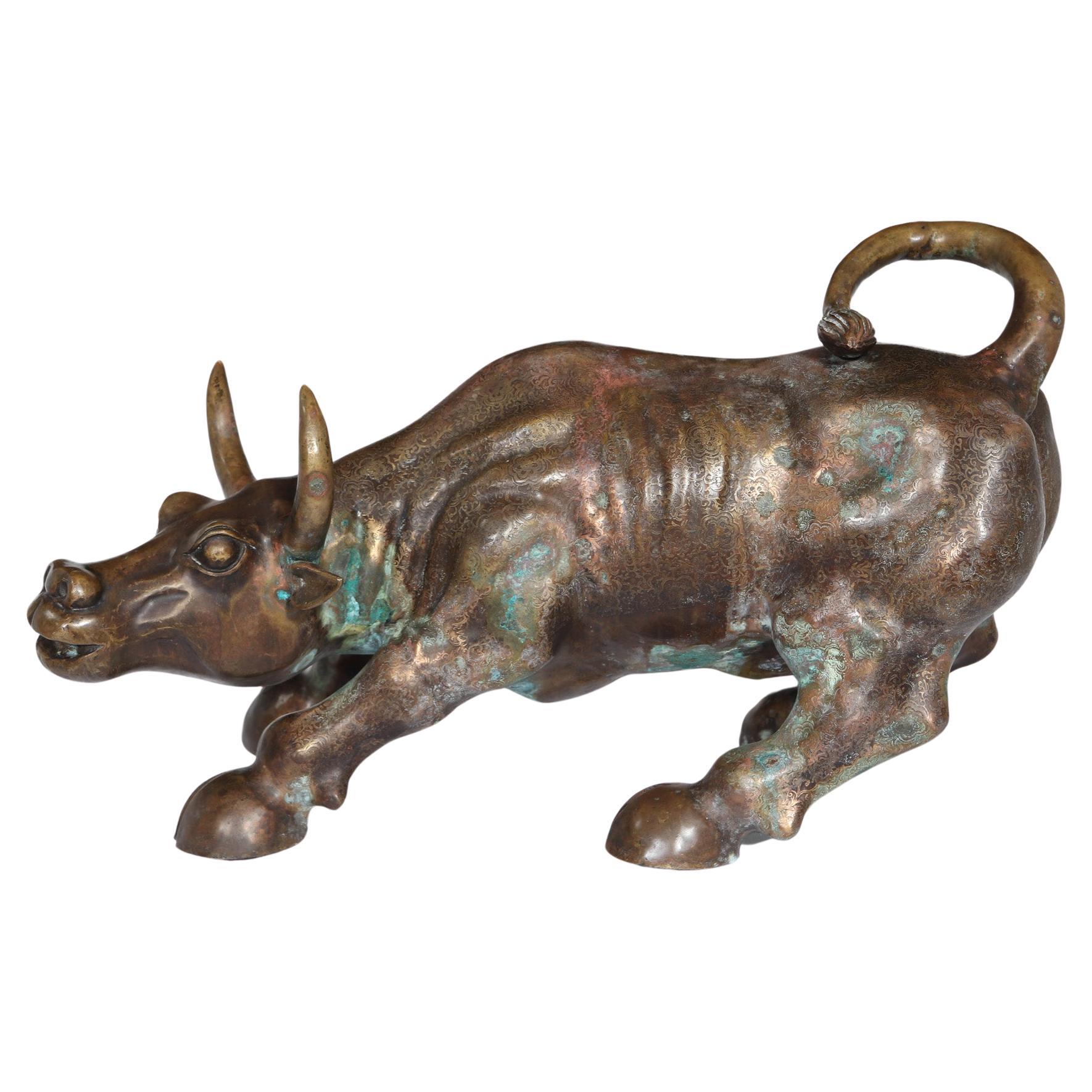 Modernist Bronze Charging Bull Sculpture For Sale