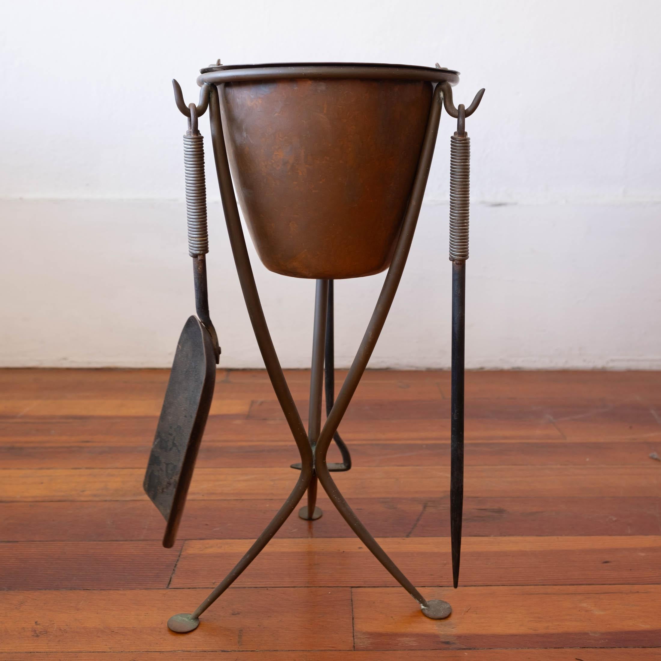 Modernist solid bronze fire tool set with metal wrapped handles. Hand hammered removable ash bucket. Wonderful original finish with a nice patina. 