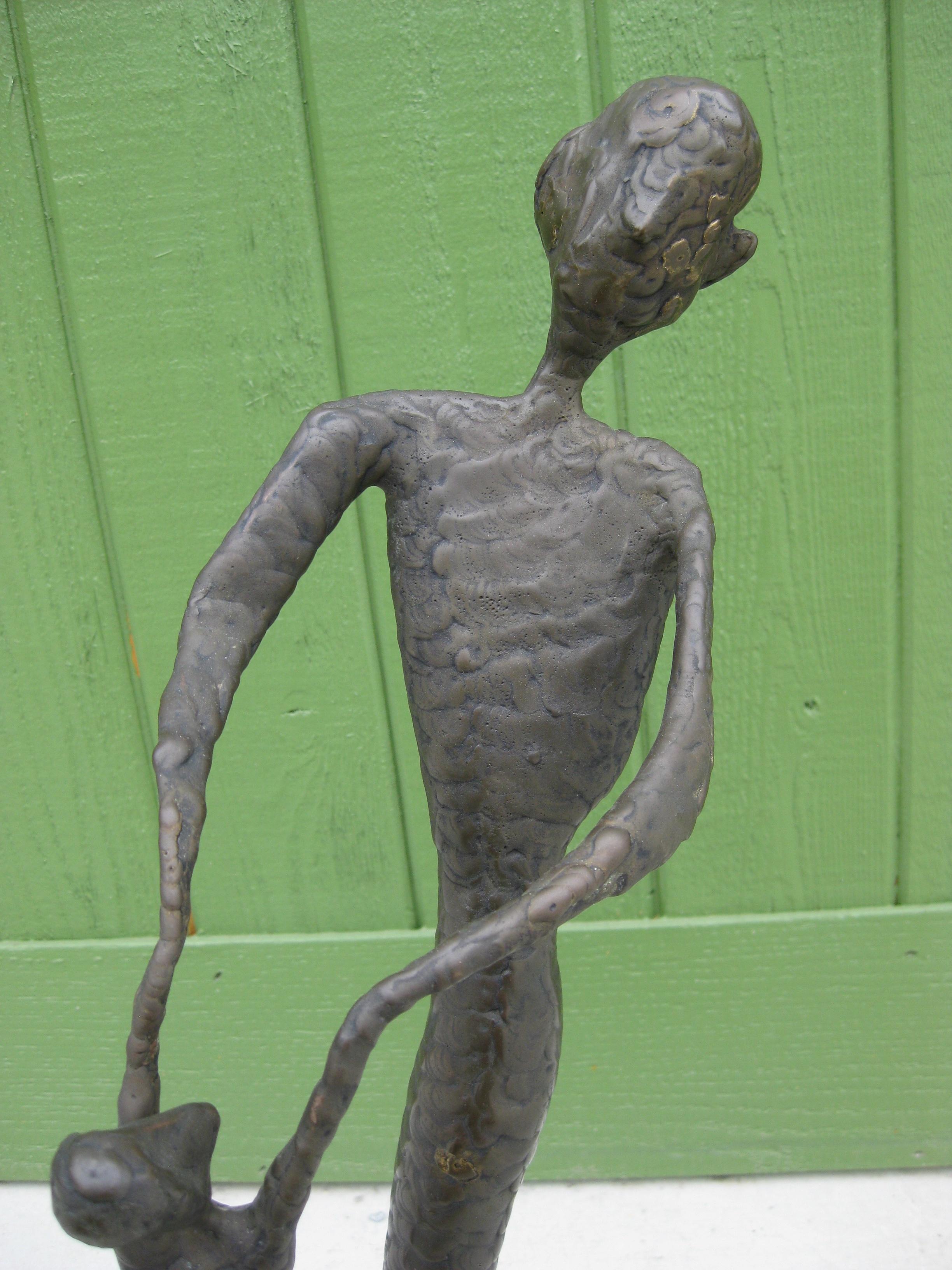 We are offering a wonderful modernist abstract hand made sculpture of a woman and child by the artist Burry. The sculpture dates from the 1960's. Made of welded metal and has a bronze finish. Wonderful form and design. Base is made of walnut wood.