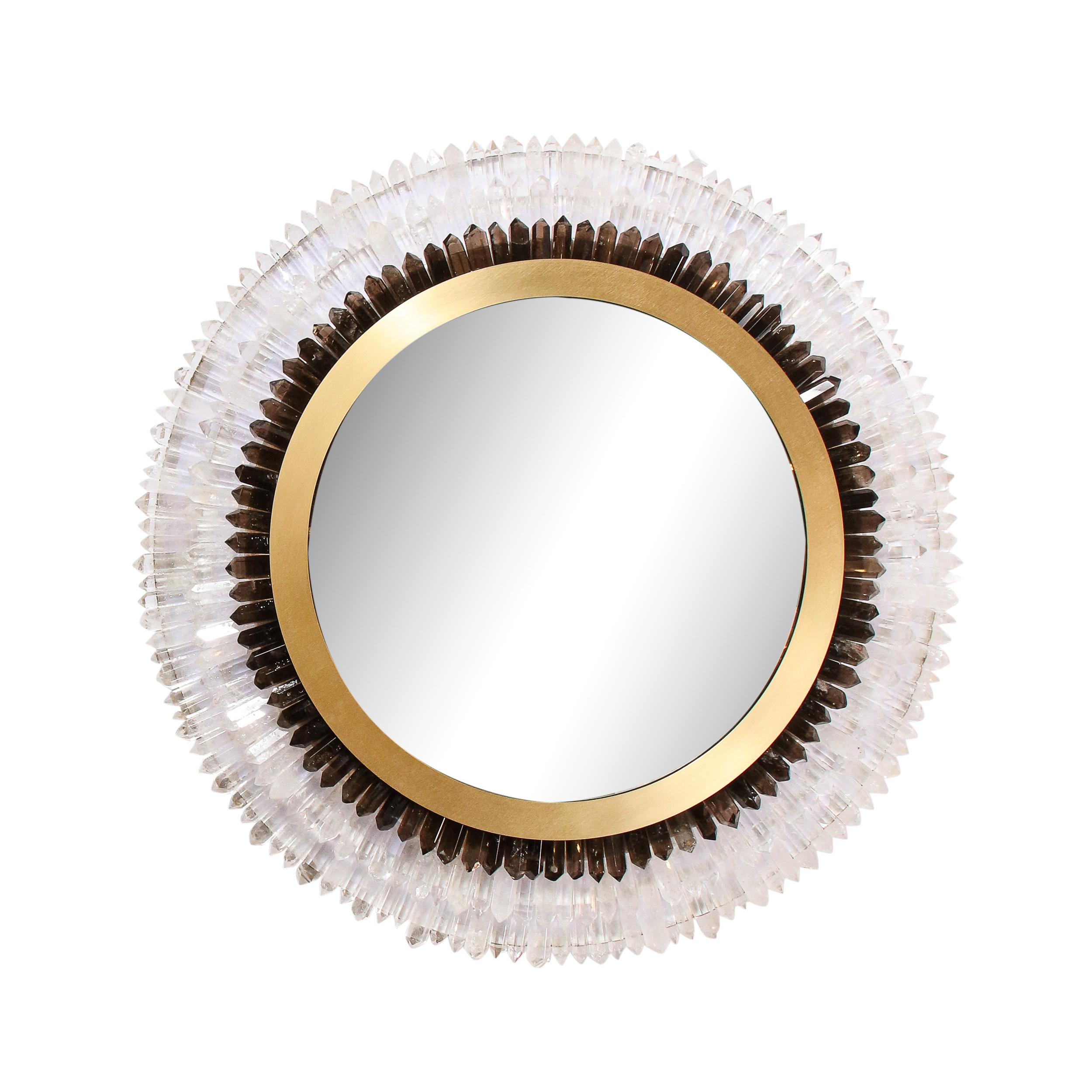 Using the finest materials available- including super fine rock crystal sourced from Brazil- this dramatic wall mirror was realized by artisans in New York state exclusively for High Style Deco. The piece offers a circular form with three tiers of
