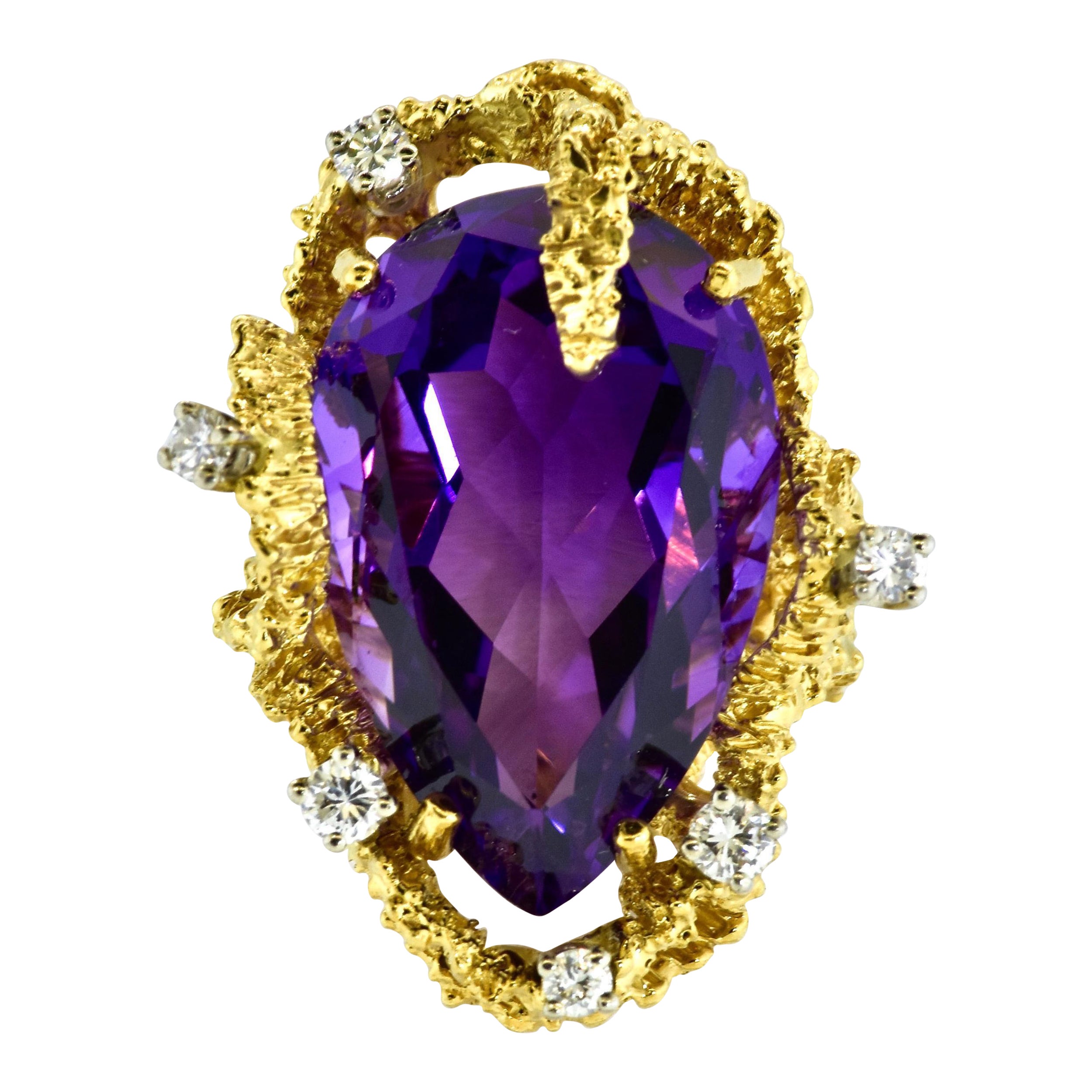 Brutalist 18K ring with amethyst and diamonds probably by Arthur King an American designer in the 1960's and 1970's.  His jewelry can be seen in major museums such as MOMA and the V & A in London.  He was also collected by many of the major movie