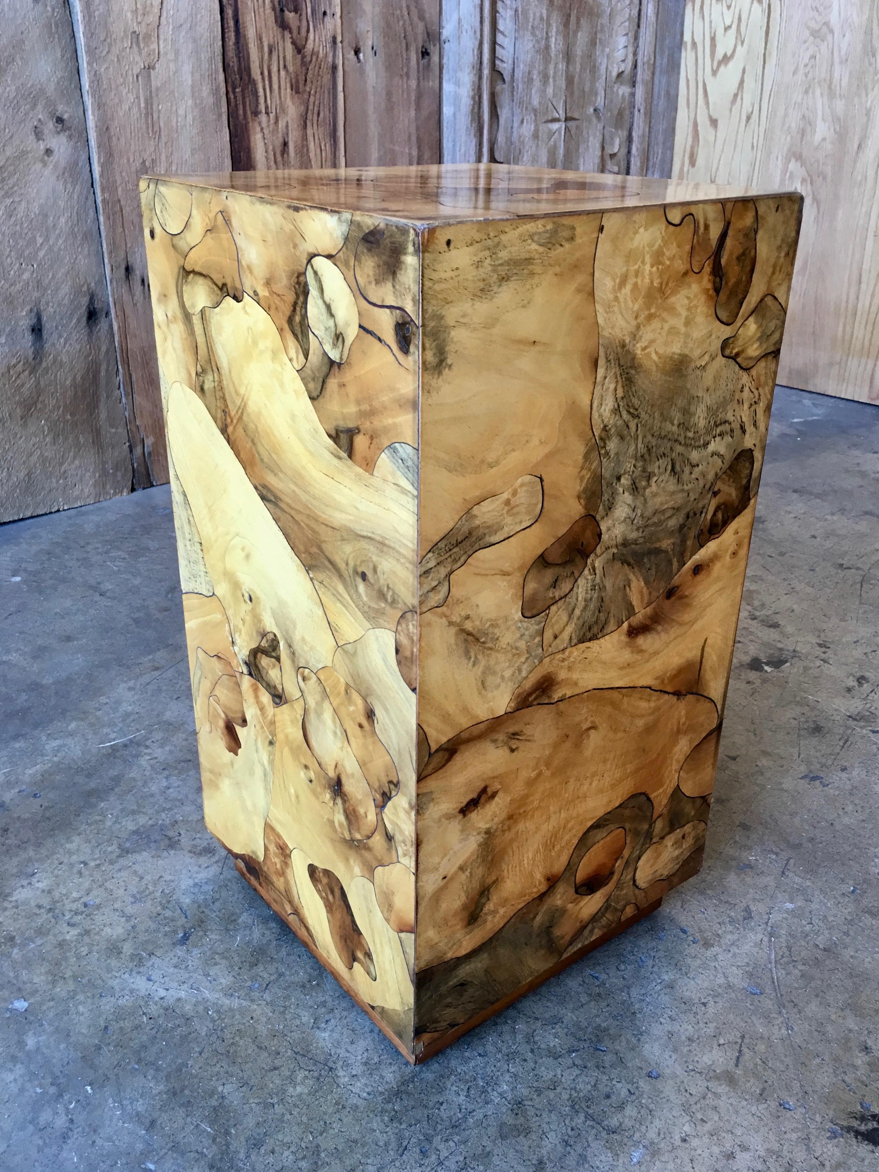 Nice burled wood column that can be used as a table or to display a sculpture.