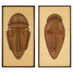Modernist Carved Wood Face Decorative Sculpture Panel, a pair