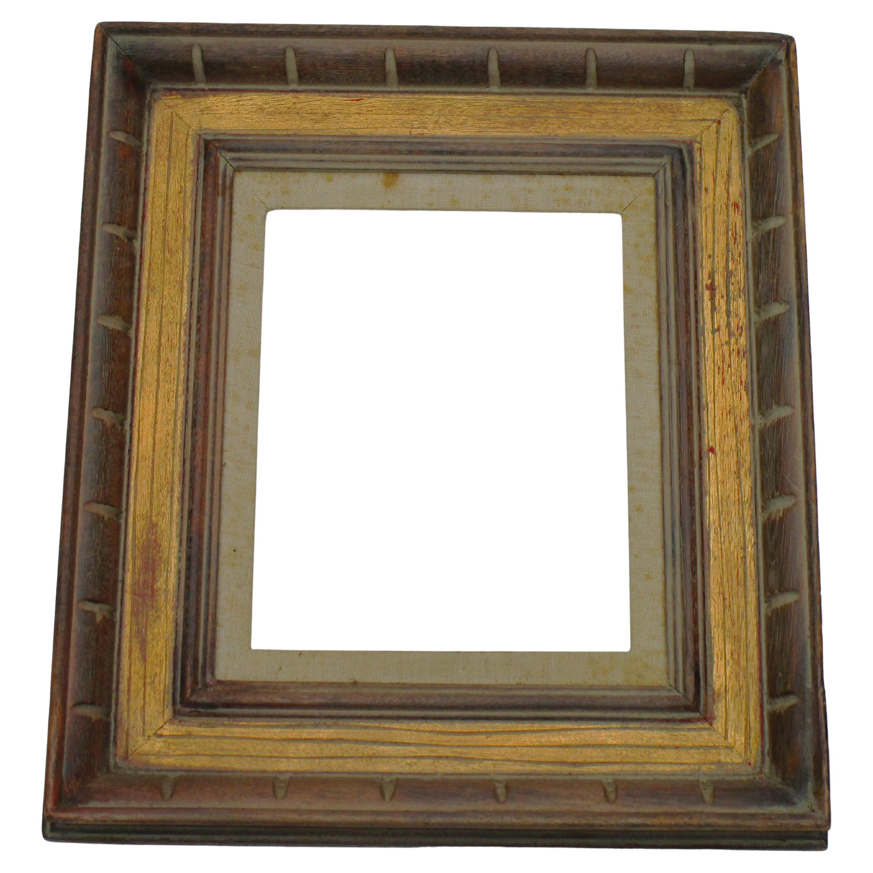 Modernist hand carved wood and gilded picture frame w/ linen liner. The frame in original limed surface / the gilding showing some underlying red bole. Old paper label on back - Los Angeles Frame Co. - see img 5. Frame measures as shown in primary