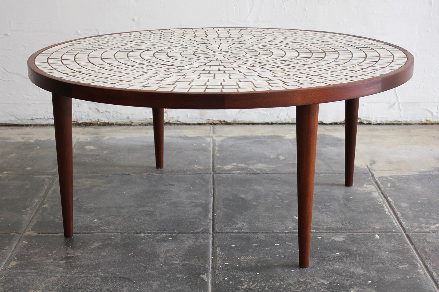 Beautiful ceramic tile-top walnut coffee table designed and made by Gordon & Jane Martz. In excellent condition. Tiles are perfect and the wood has been hand oiled. Grain and color of the American walnut wood is second to none. Measures: 36 1/2