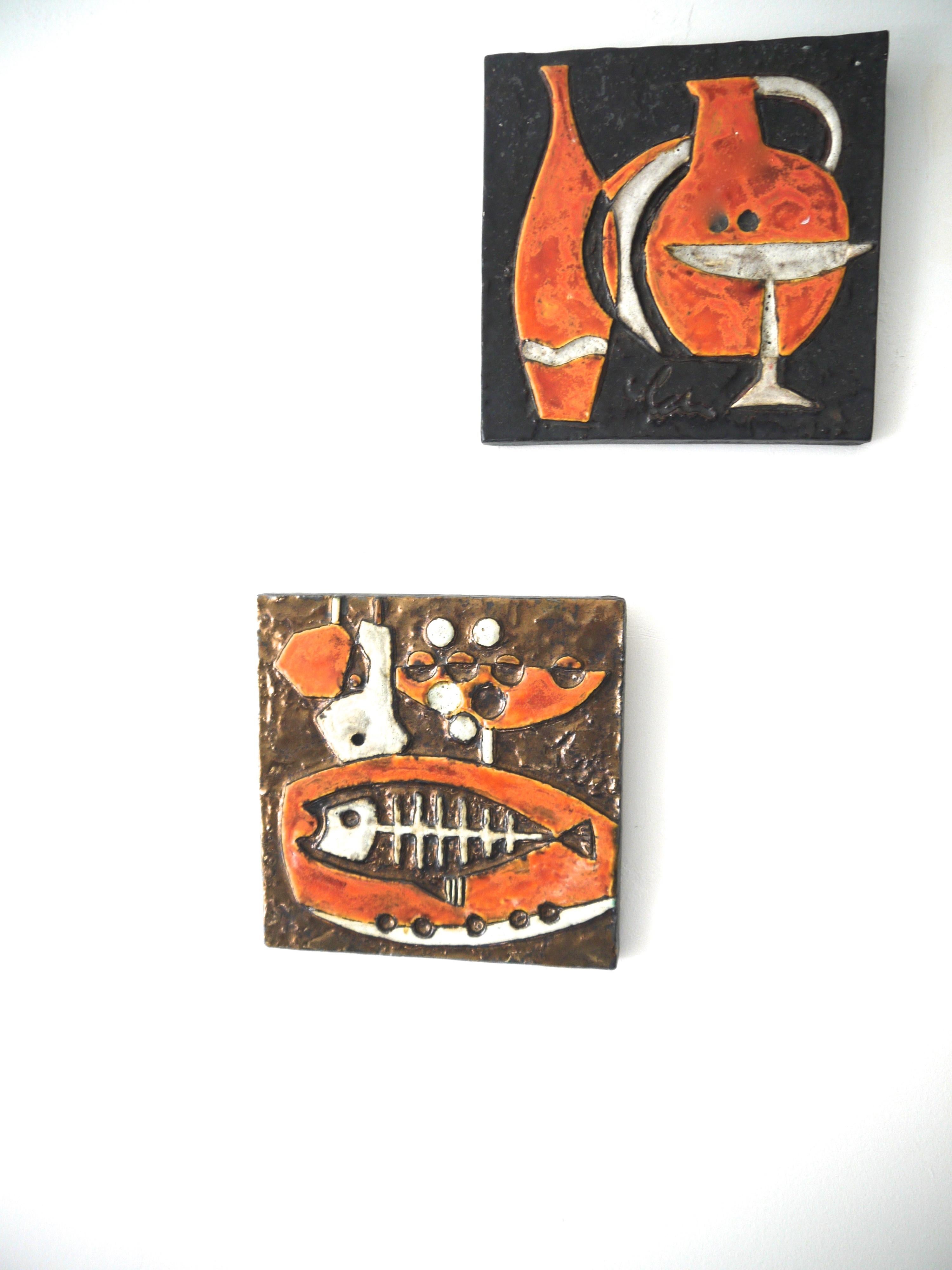 Modernist ceramic wall plaques - Set of three by Helmut Schaffenacker late 1950s. The complete series celebrates music, food and wine. 

The plaques are 23cms square and approximate 3cms in depth.

 