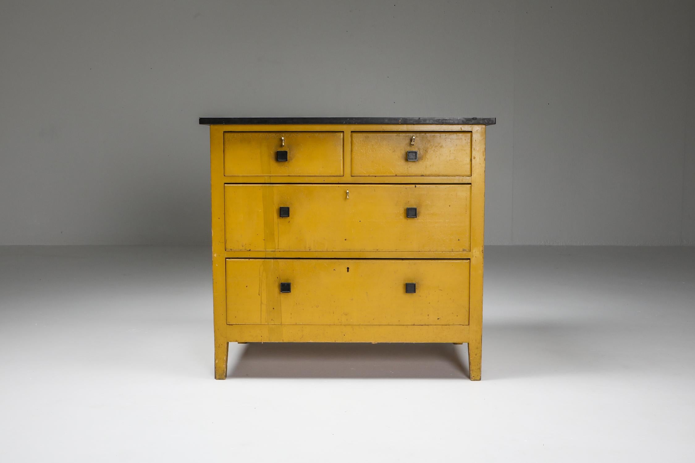 Modernist Yellow chest of drawers, Hendrik Wouda, H. Pander & Zonen, Netherlands, 1924.

Painted pine, black marble top.

The Interbellum, the period between the two World Wars, was a time when culture Dutch blossomed. Architects, designers and