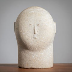 modern male head midcentury sculpture in sandstone
