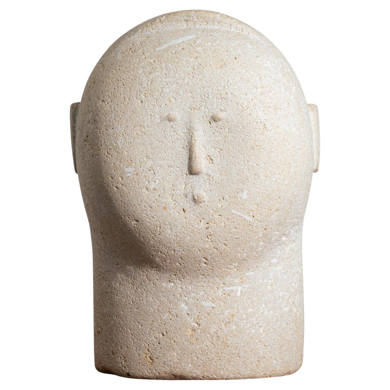 Modernist sculpted male bust in sandstone