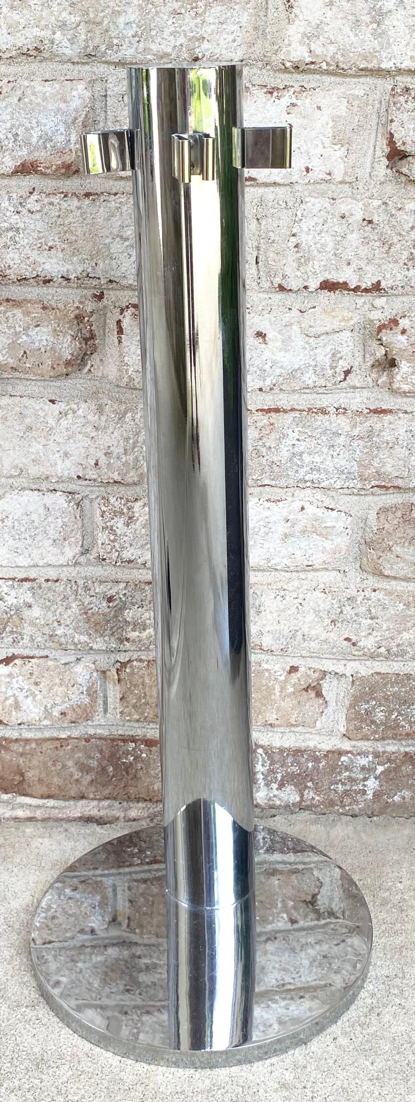 Modernist chrome fireplace tools with spring handles.

The measurements for the stand are 26.5