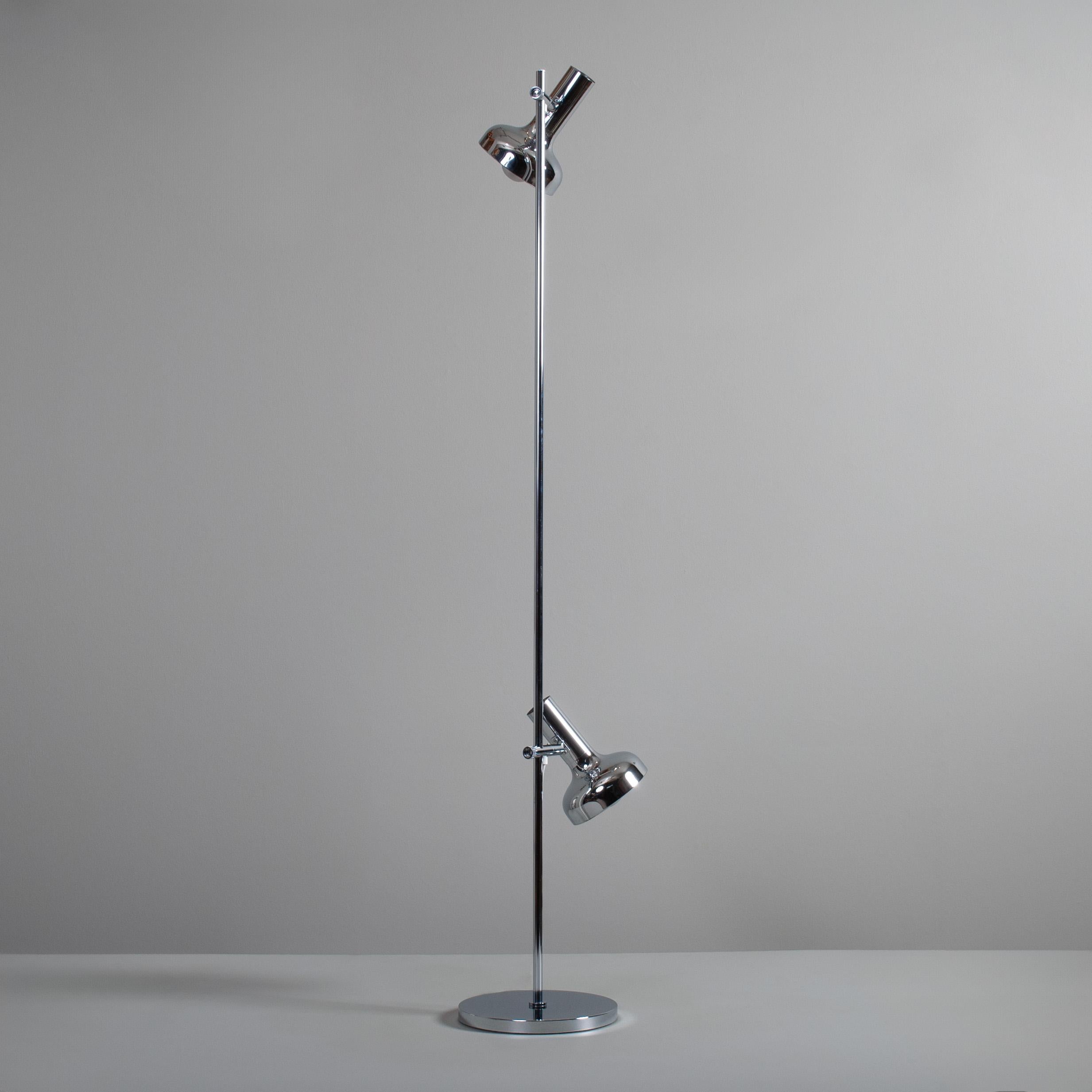 A sparkling chrome dual headed modernist floor lamp. 
Produced circa 1960's and in lovely condition. Can be used worldwide with the change of plug/adaptor.