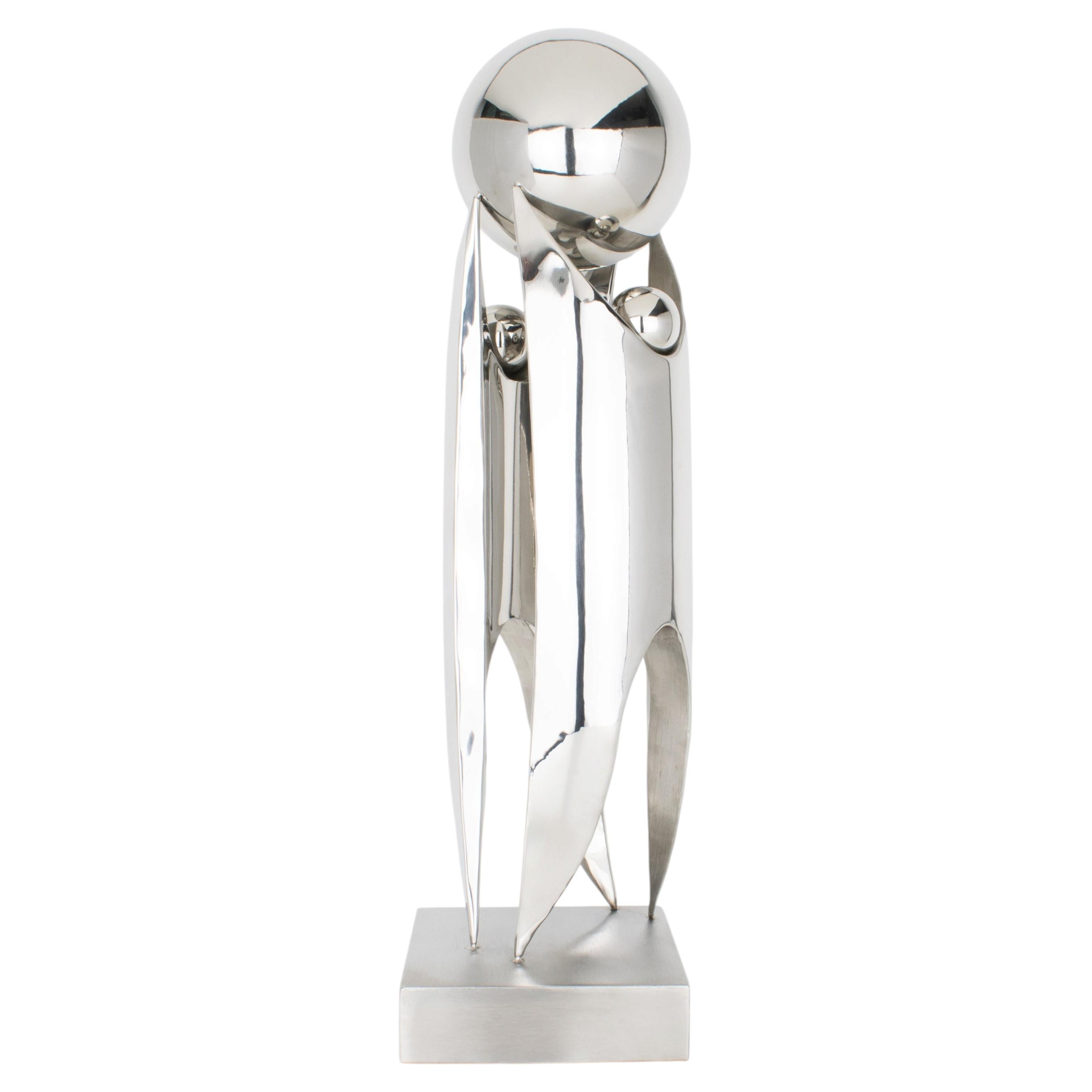 Modernist Chrome Sculpture with Abstract Figures and Globe Form, circa 1990
