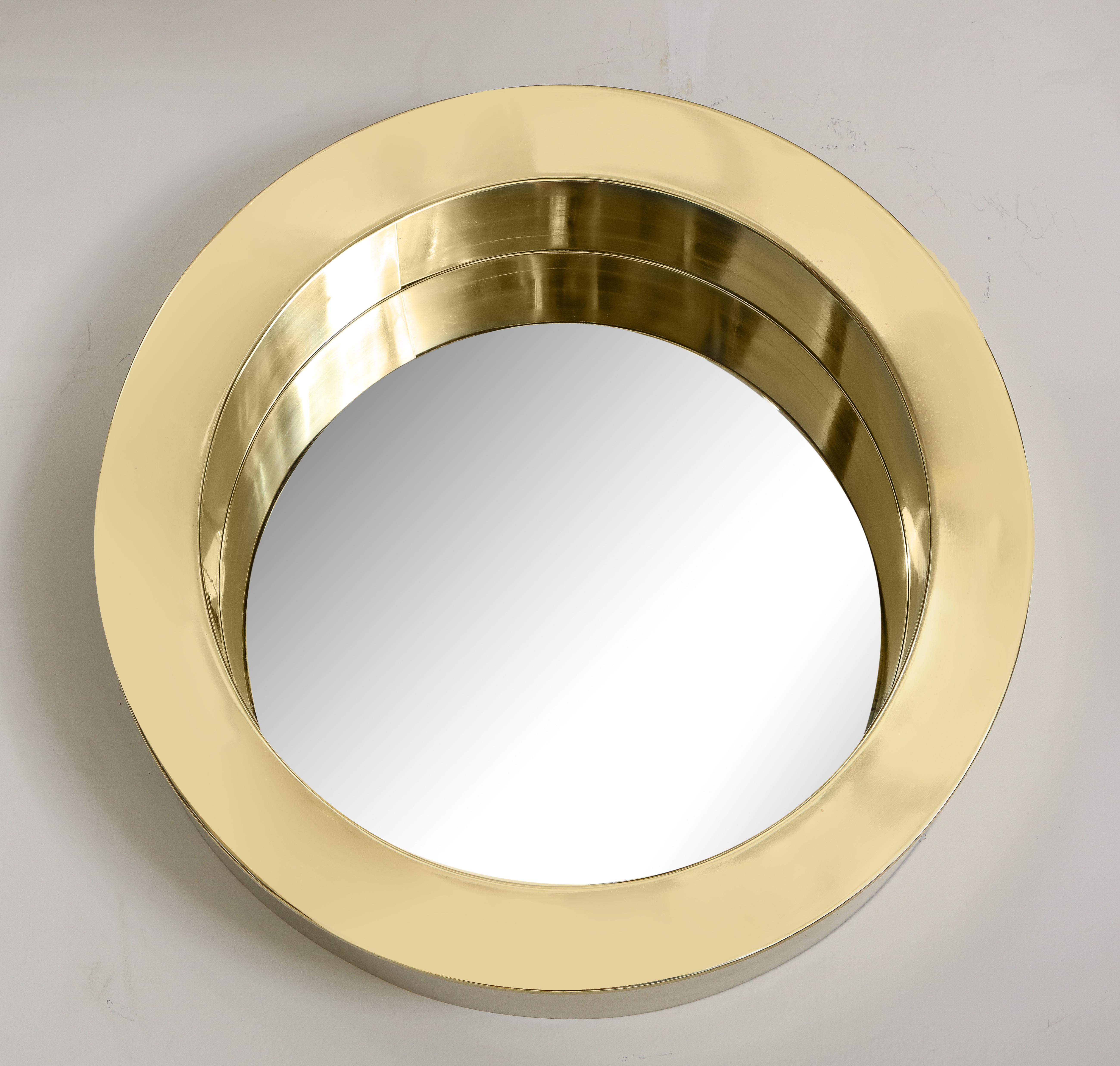 Modernist circular brass mirror.