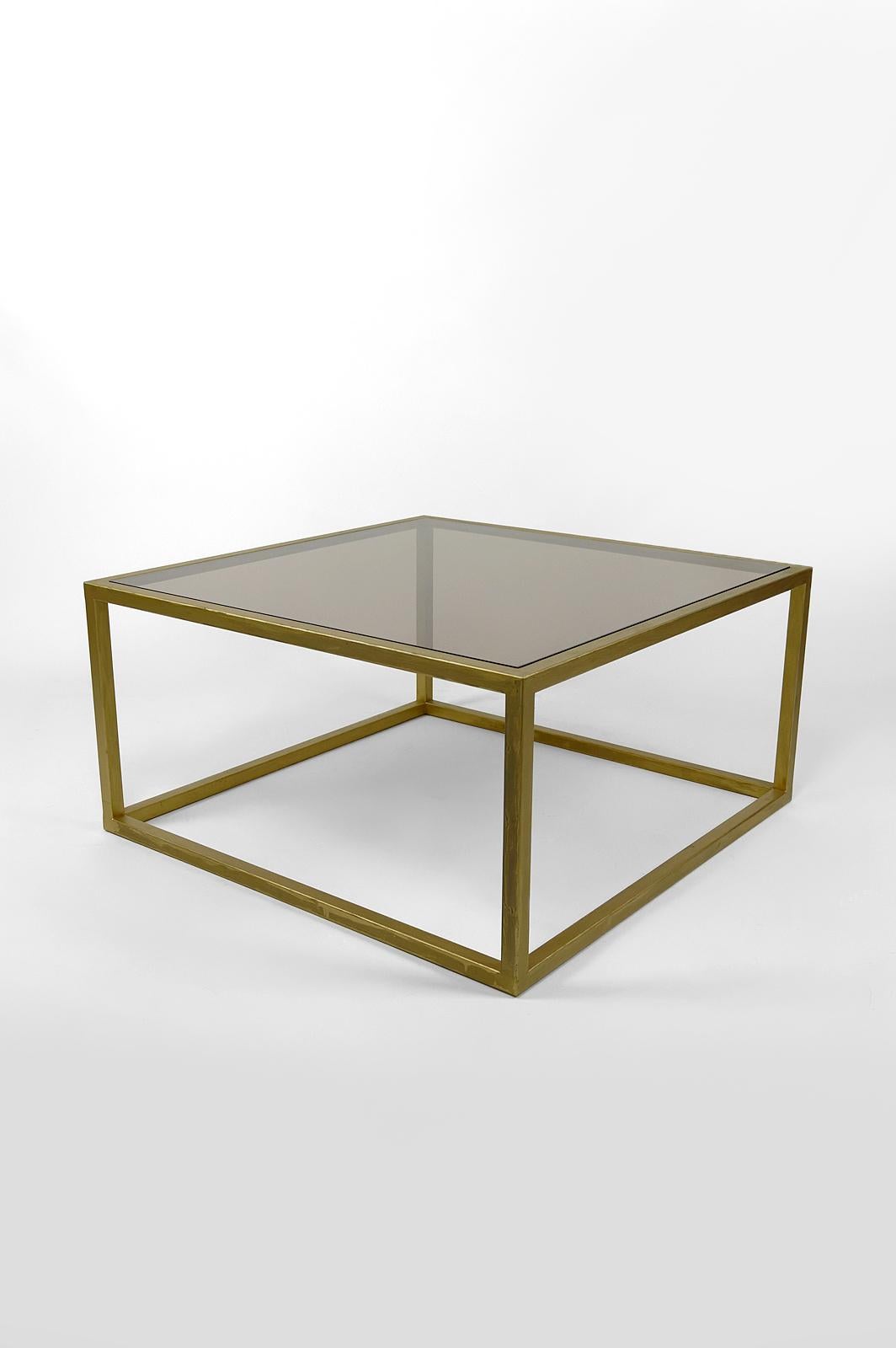 Post-Modern Modernist coffee table in gilded metal and smoked glass, France, Circa 1970 For Sale