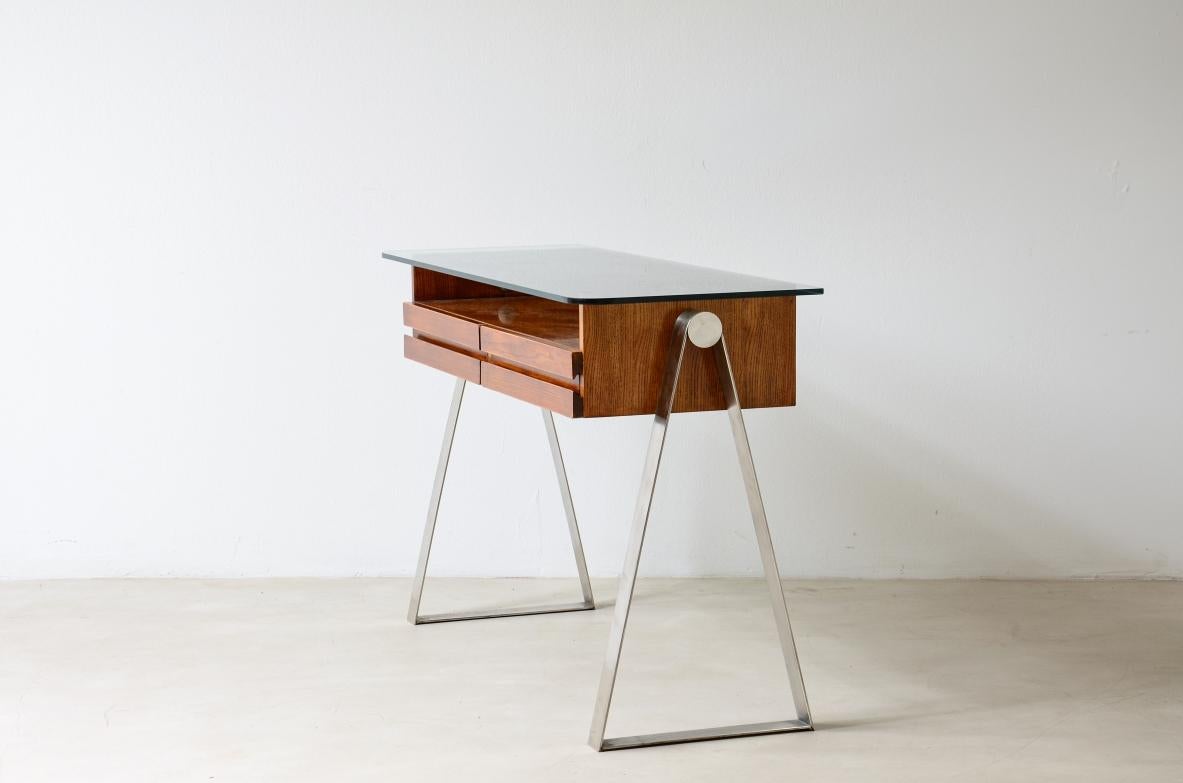 COD-2699
Modernist console in blond oak with steel structure, two drawers and storage compartment with thick ground glass top.

Italian manufacture 1960ca.