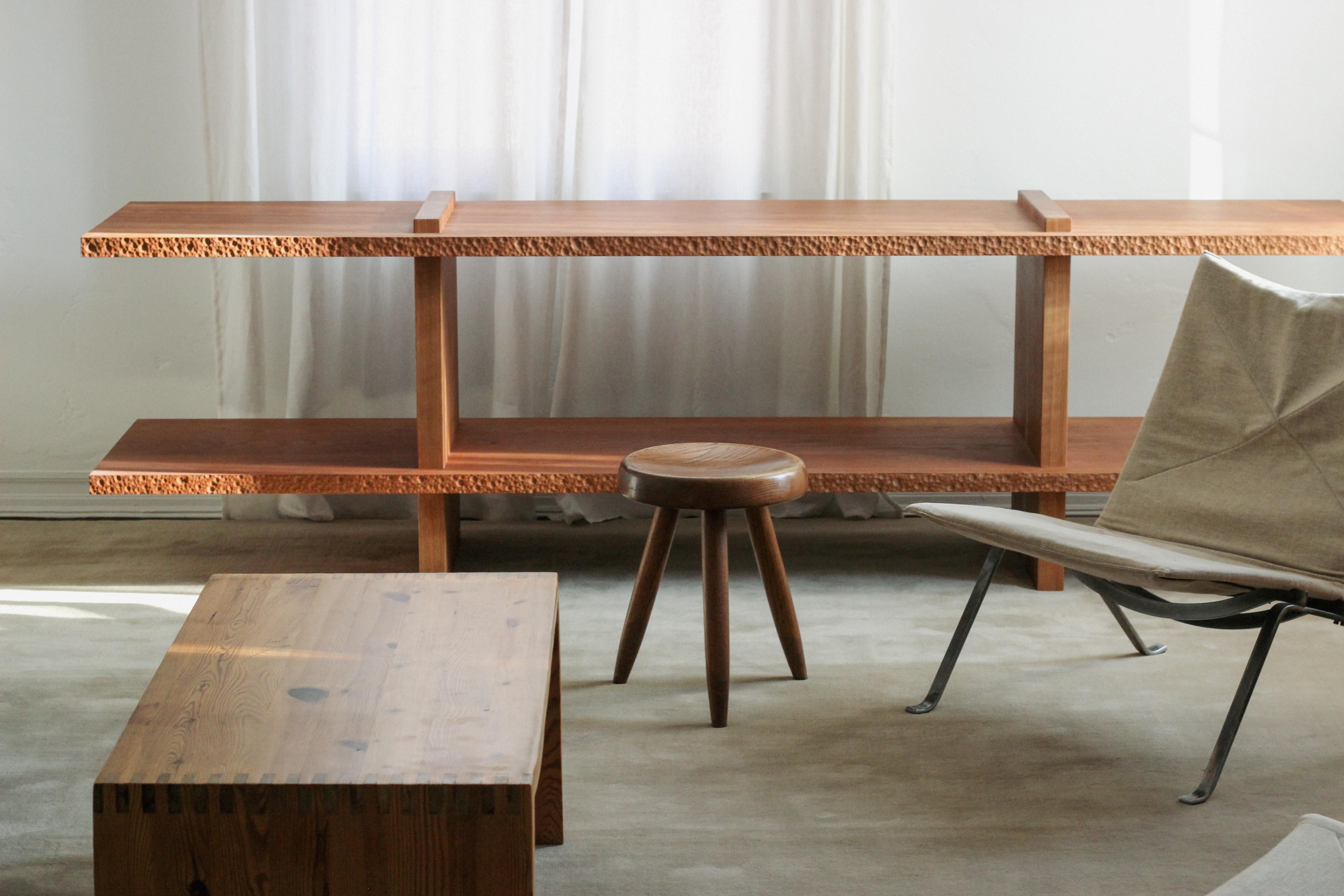 Modernist console in cherry makes for a stunning low bookcase, space divider or sofa table. 

Made by hand by expert craftsmen in Los Angeles, CA. 

Custom sizes and finishes are available upon request. 

Optional additional finishes include