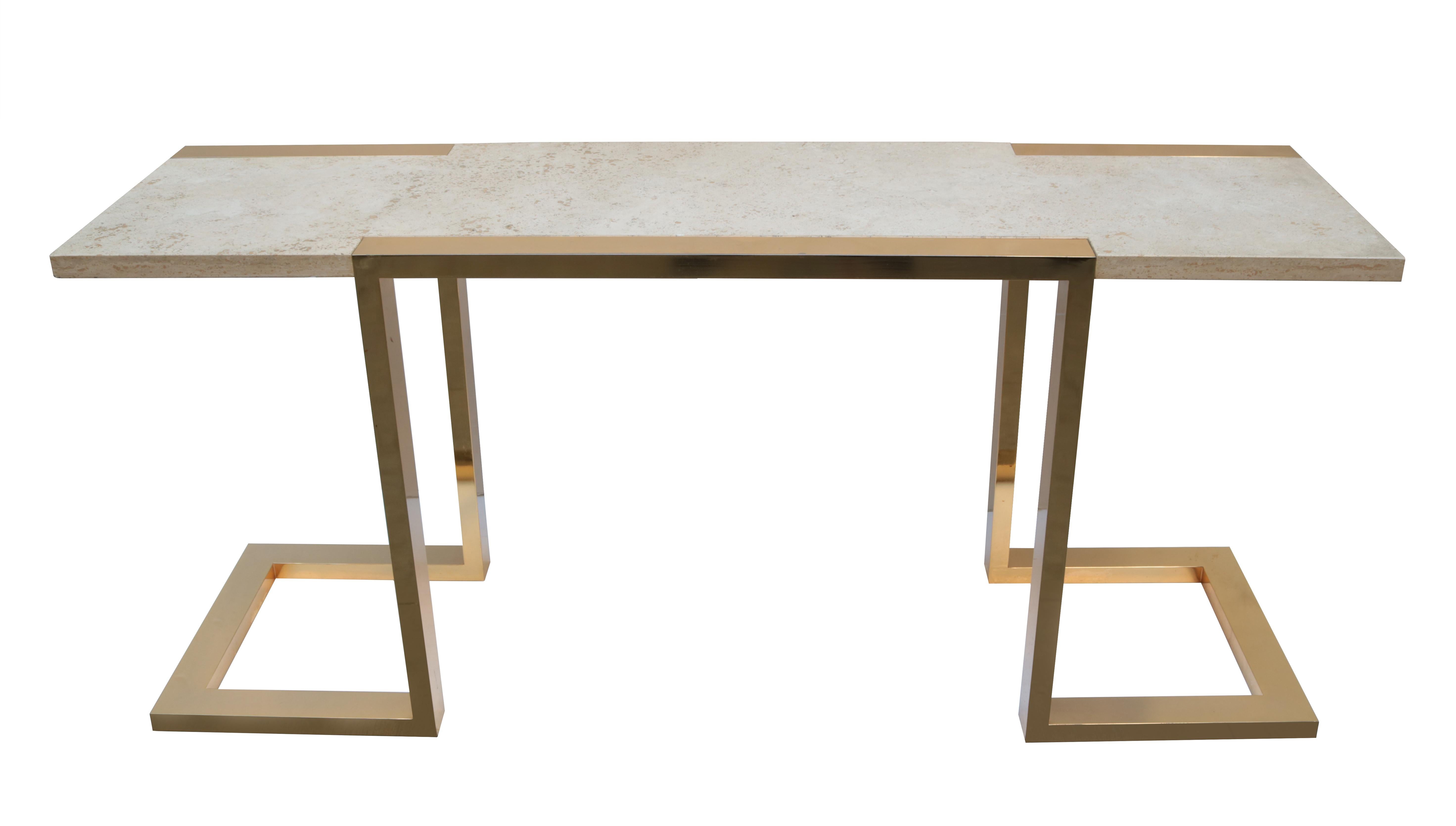 A Modernist console table by Alfredo Freda for Cittone Oggi.
Patinated brass frame and travertine top.