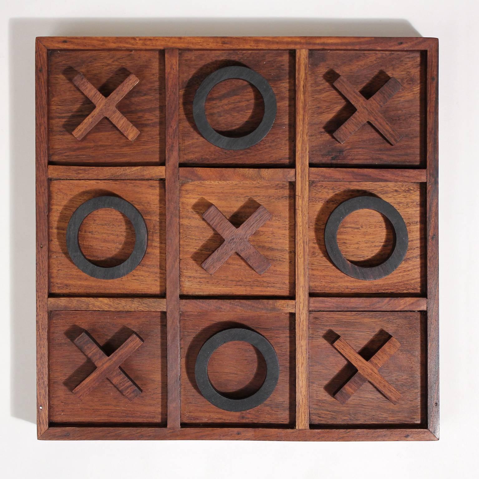 Great handmade modernist craftsman studio Tic Tac Toe sculptural rosewood wood game. Artist made but no signatures. Each piece was hand-carved and well made. Woods are rosewood, walnut and ebony. In great shape. One of a kind item.
