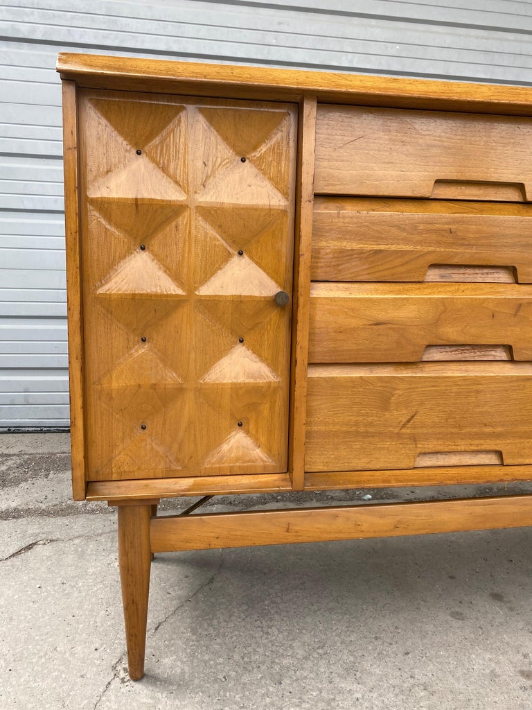 Modernist credenza /server, button tufted doors designed by Salvatore Bevelacqua, Classic design, amazing quality and construction. Featuring 8 dovetail drawers, left and right storage, retains original condition, finish, age appropriate wear, minor