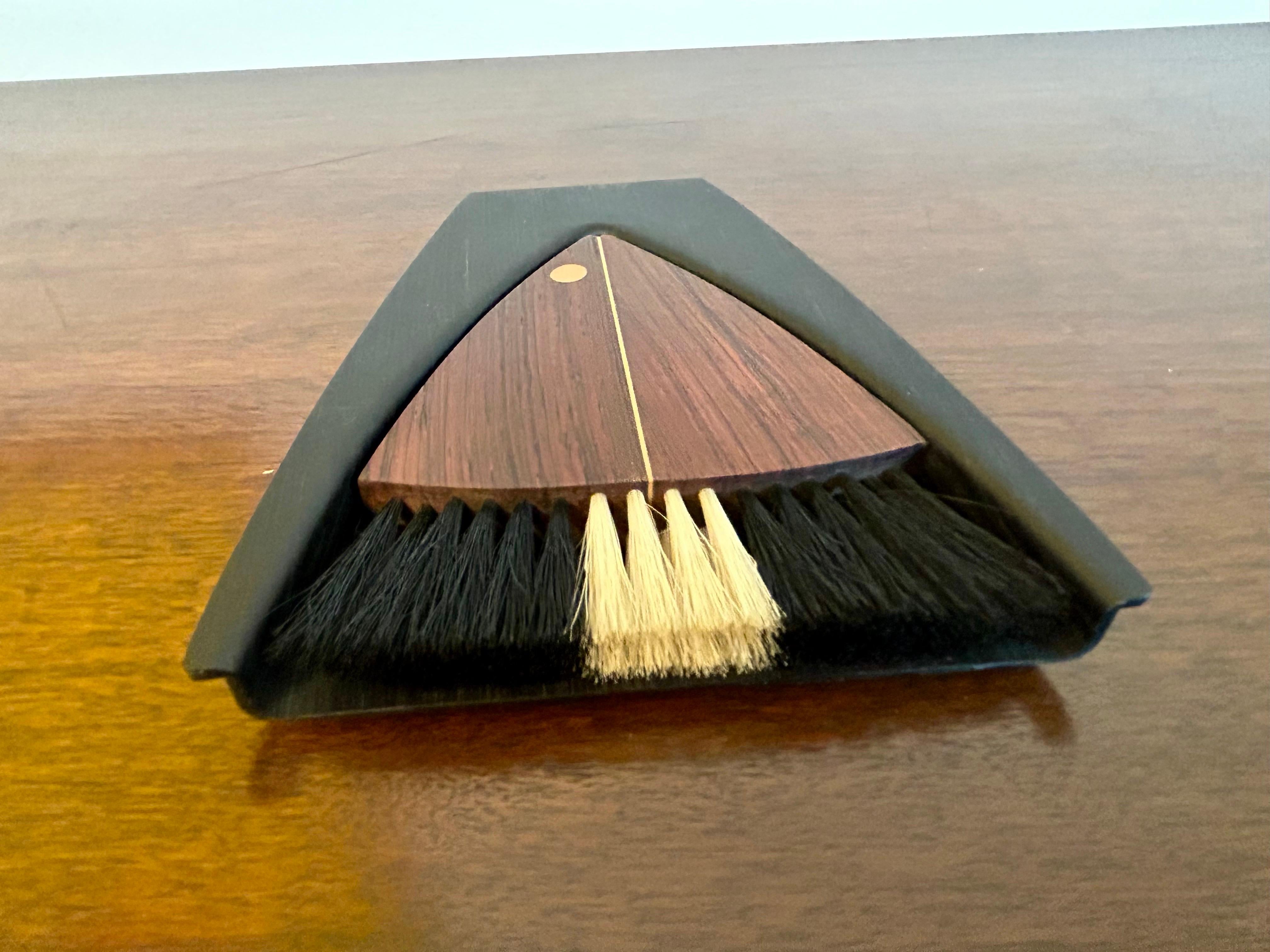 Whimsical modern design.
Mixed woods.
Great for dusting those little crumbs and hairs around the home, office or car....
