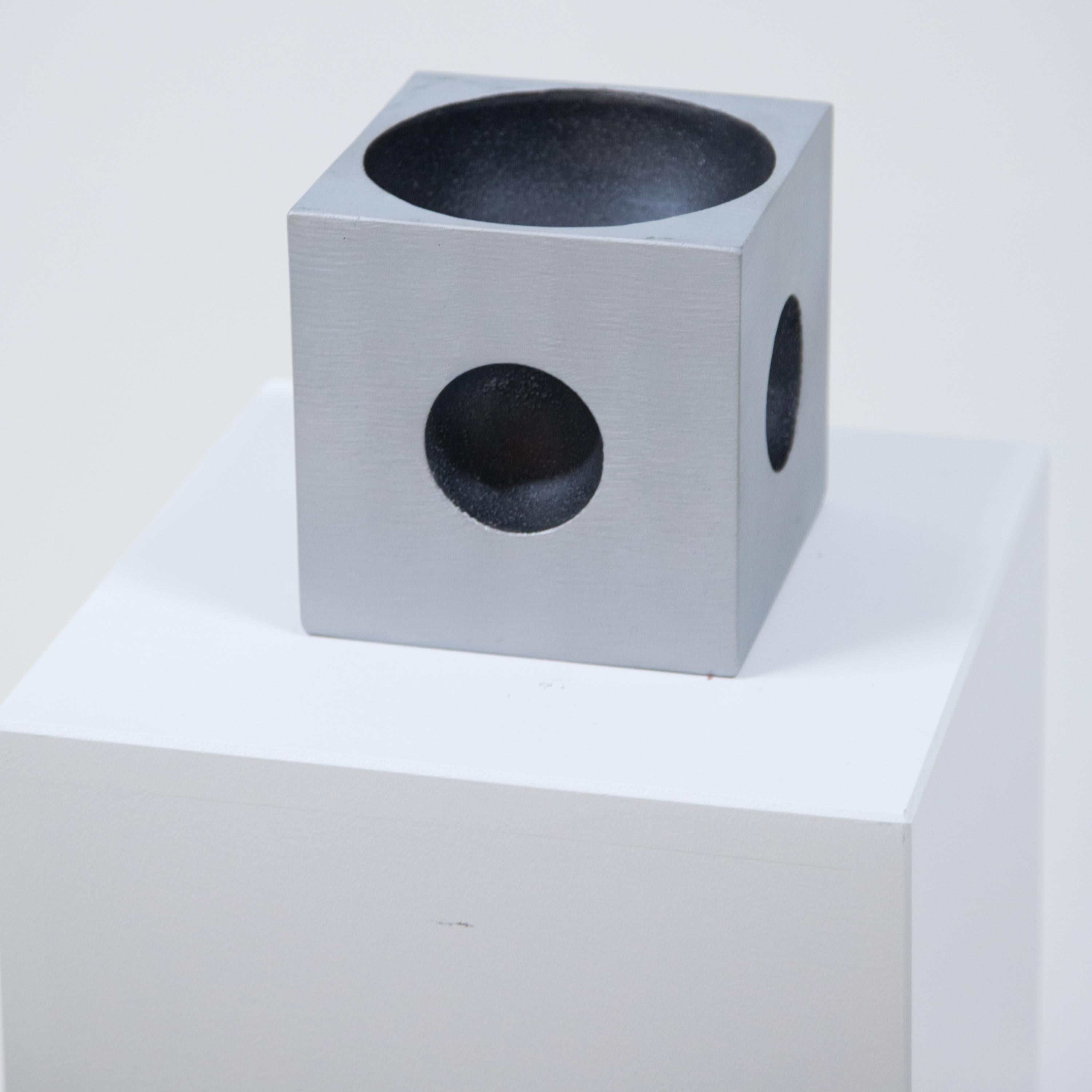 A Modernist cube sculpture.
By artist Lorenzo Burchiellaro.
Textured cast aluminum
with concave top and side details.
Signed underneath Burchiellaro.
 