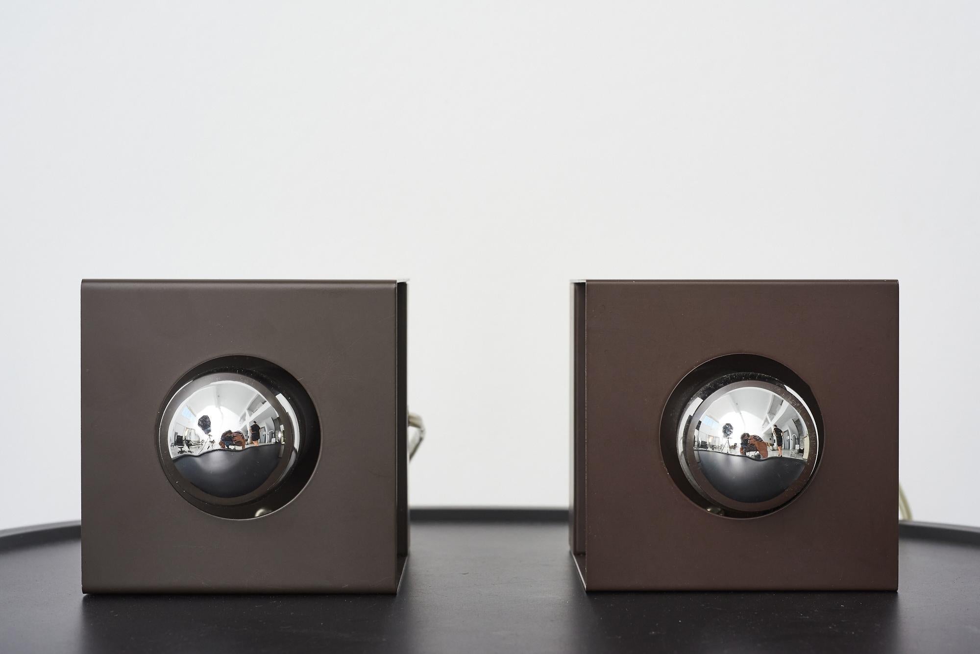 A set of 2 Modernist cube wall lamps by Philips, The Netherlands, 1980s
The lamps have an on/off button and plugs to put directly to the wall.