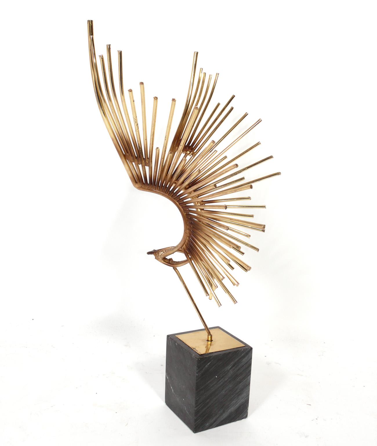 Modernist brass eagle or bird in flight sculpture, by C. Jere, American, circa 1970s. Signed and dated at base, see detail photo. It measures an impressive 29