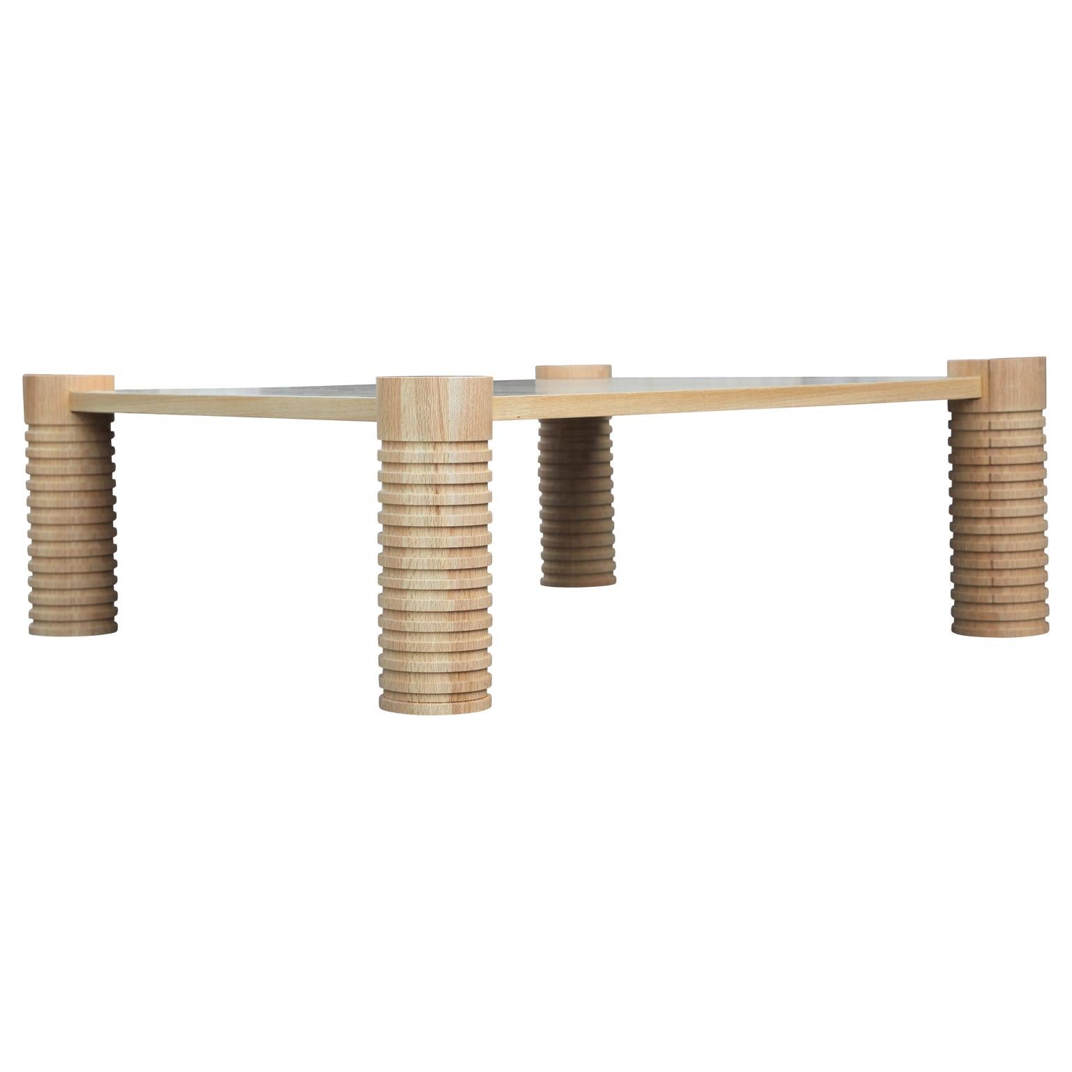 Modernist custom square coffee table with unique oak legs that have been hand turned on a lathe. Made in Houston, TX by Reeves Design + Art local craftsman team.