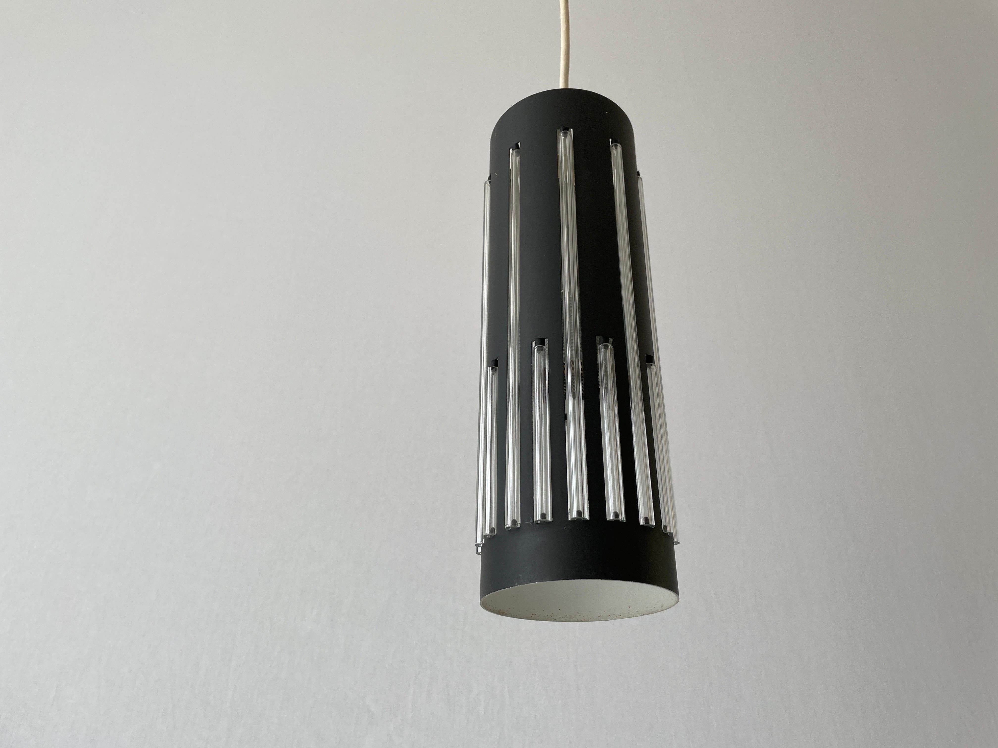 Modernist Cylinder Design Glass & Black Metal Pendant Lamp, 1960s, Germany
Quantity : 3

Lamps are in very good vintage condition.
Wear consistent with age and use

These lamp works with E27 standard light bulb. 
Wired and suitable to use in all