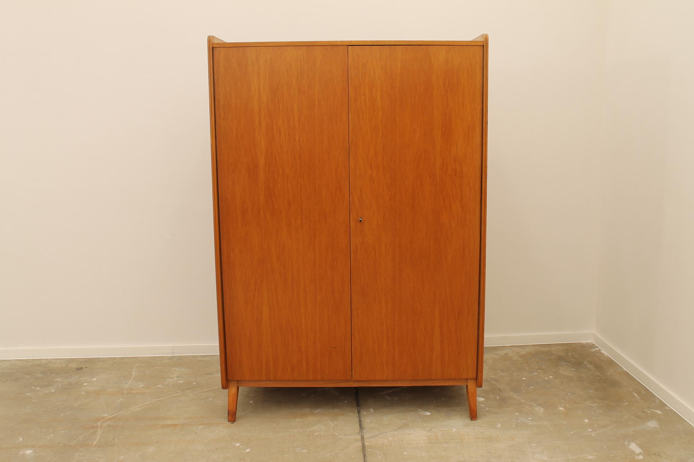 Vintage Czechoslovak modernist wardrobe designed by Frantisek Jirak for Tatra nabytok. Made in Czechoslovakia during the 1960s. It is made of beech wood and plywood. This item is in good vintage condition without visible damage, showing signs of age