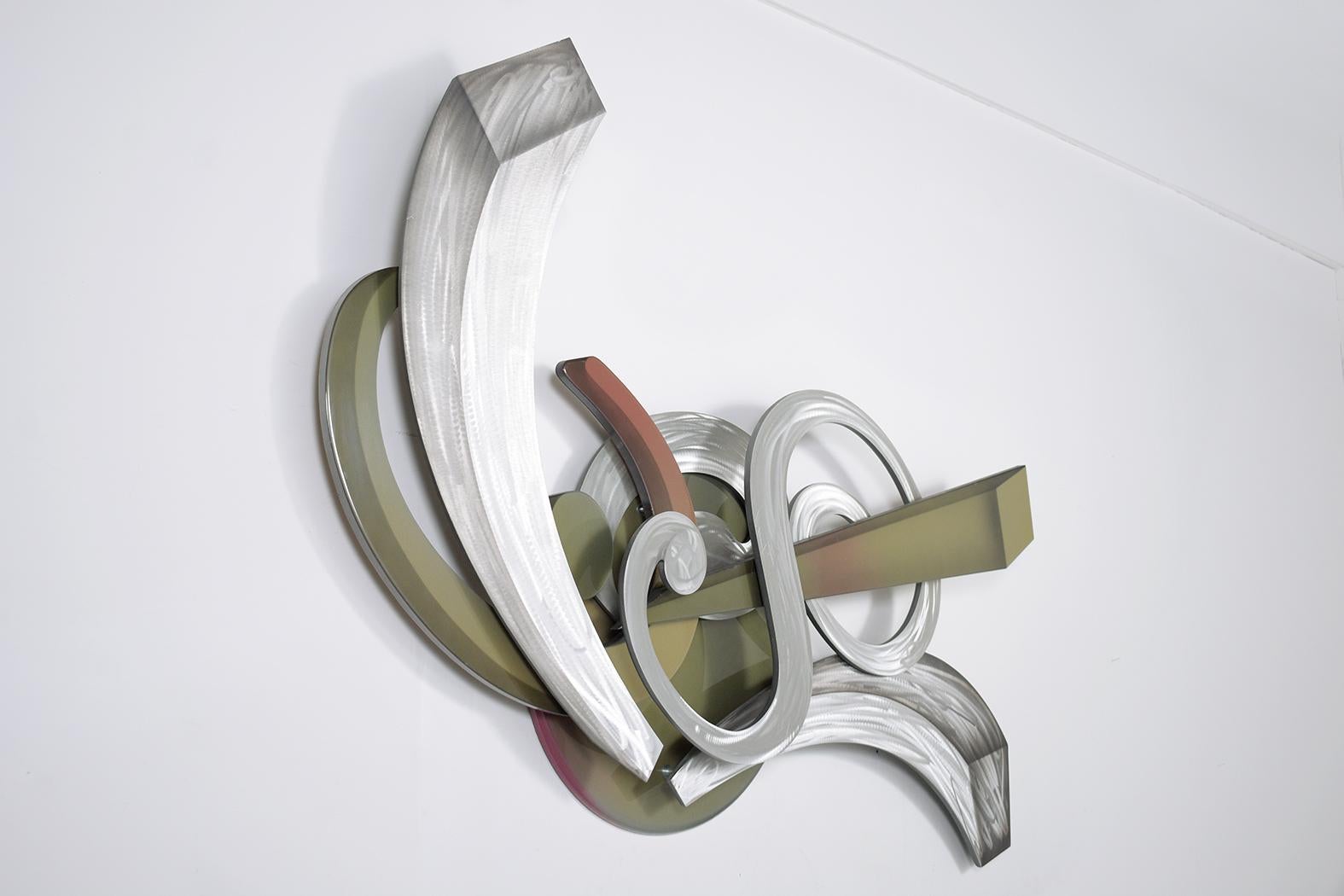 Immerse yourself in the beauty of our exceptional modern wall sculpture, masterfully constructed from a harmonious blend of wood and steel. This polished, captivating piece of art, preserved in top-notch condition, has undergone professional