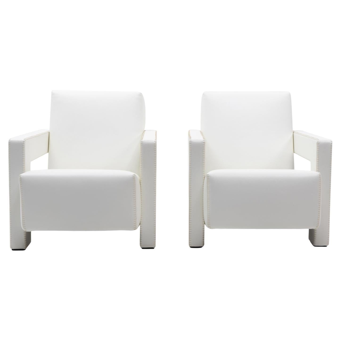 A set of two Utrecht armchairs by one of the founders of the 1920s “De Stijl” movement, Gerrit Rietveld. 

Very rare white colour leather, no longer in production, excellent condition. 

This sculptural armchair was originally designed in 1935 for 