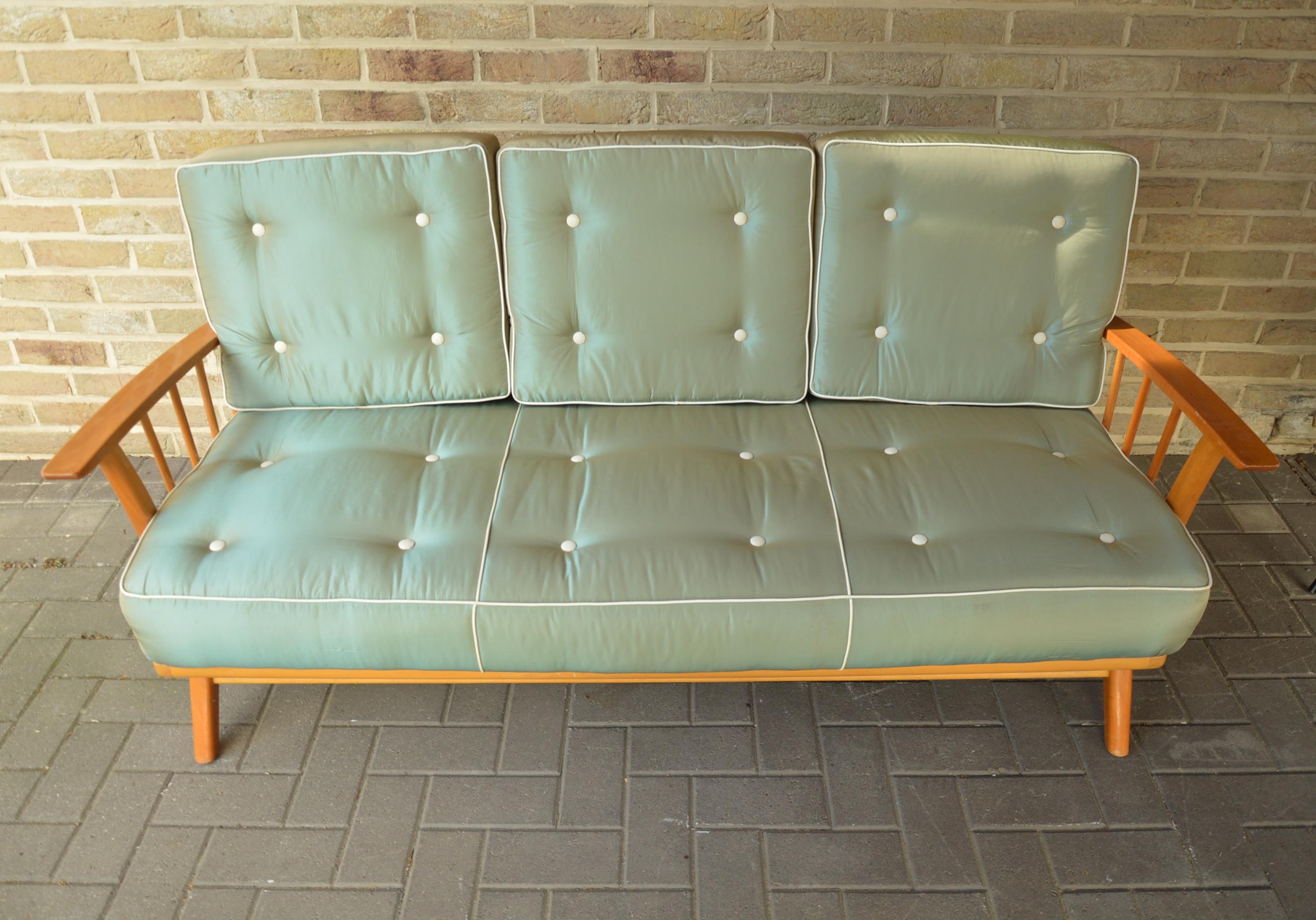 Modernist designer vintage sofa with foldable arms, 1960s.