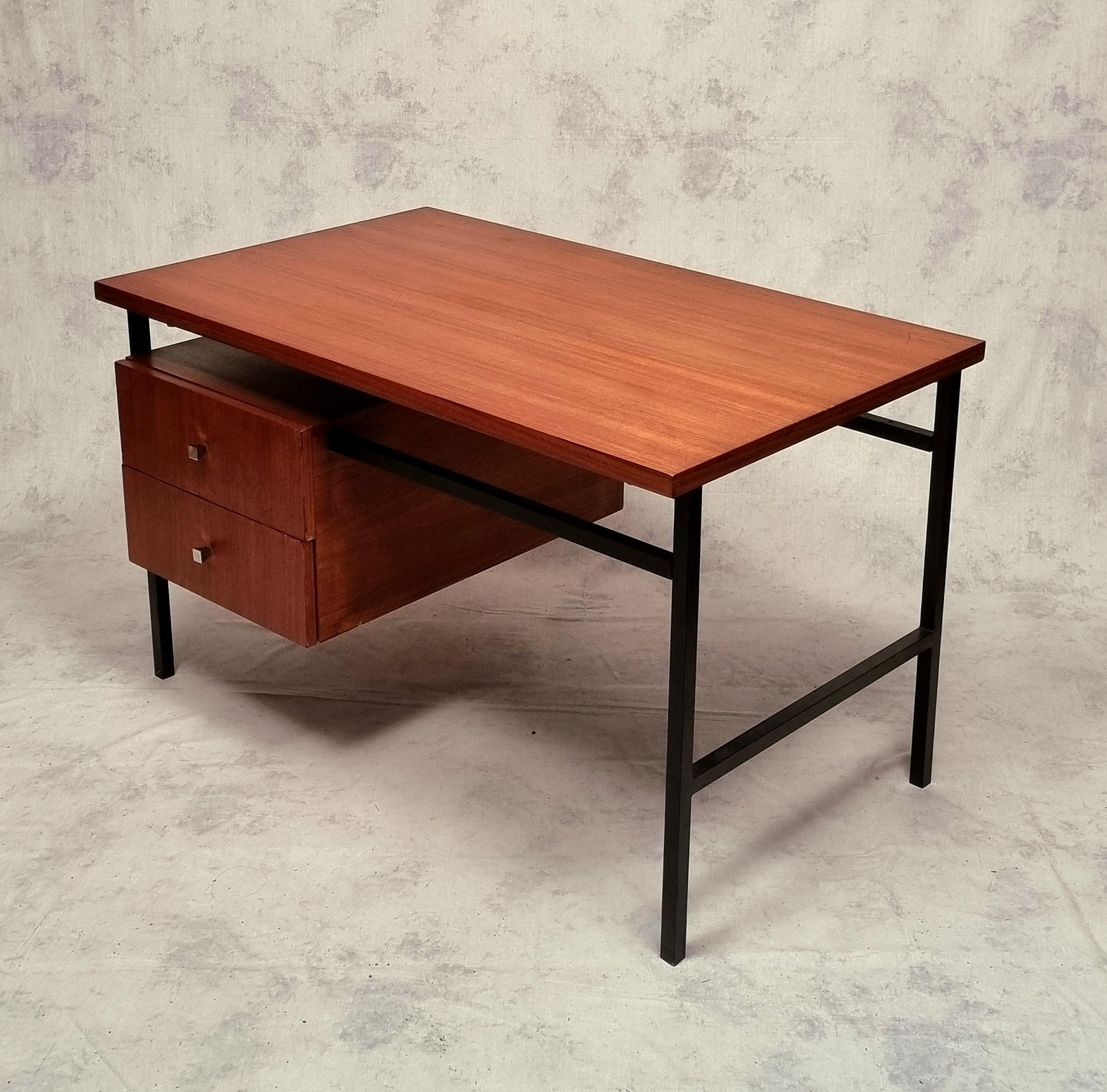 Modernist office by Luigi Bartolini. Crafted in teak, this desk is composed of a beautiful teak wood top and a suspended box in the same wood with stylized chrome metal handles. It is based on a black lacquered square tube structure typical of the