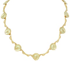 Collana modernista con diamante in oro giallo 18 carati con catena di ninfee vintage