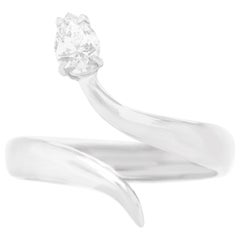 Anello a serpente modernista con diamanti incastonati