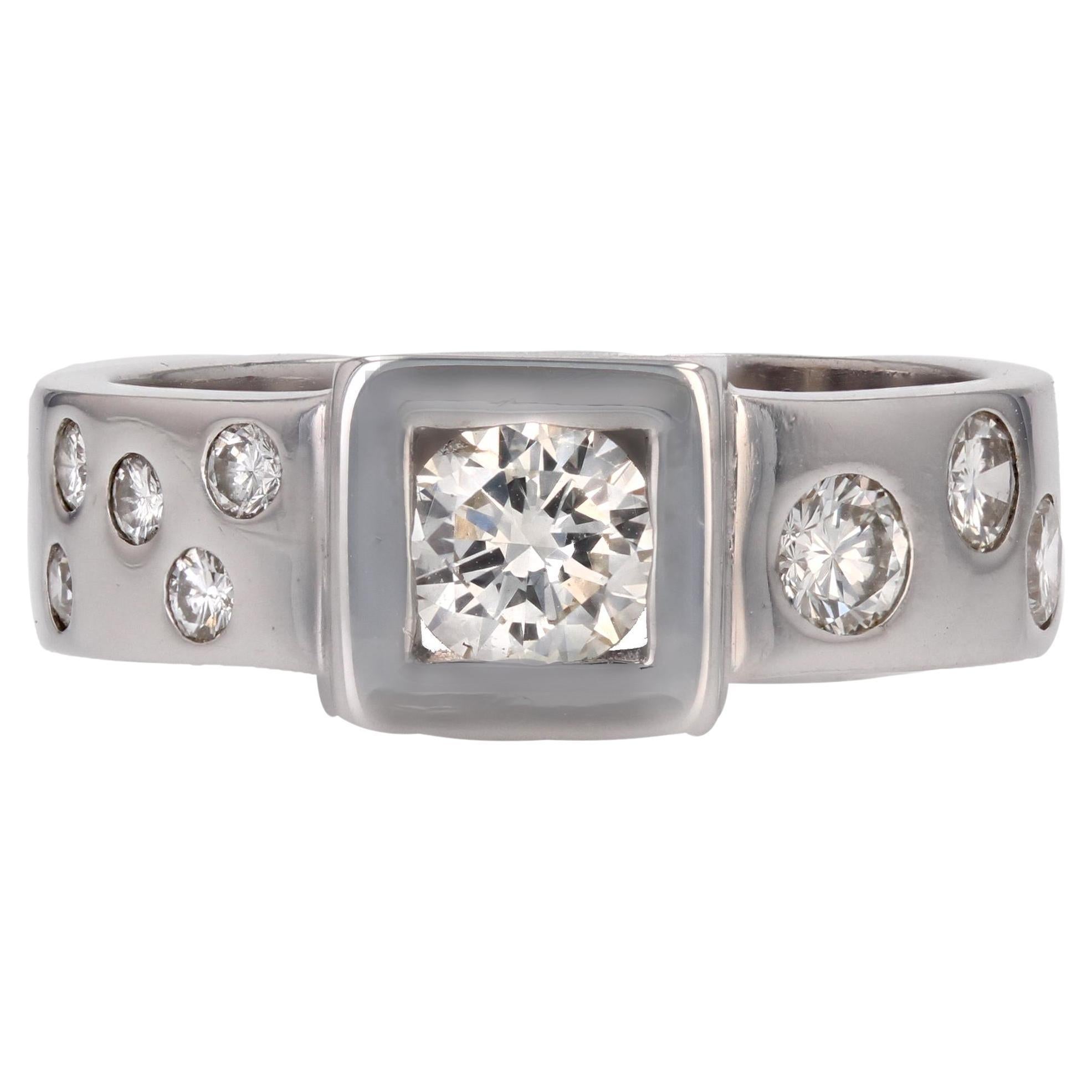 Bague moderniste en or blanc 18 carats avec diamants