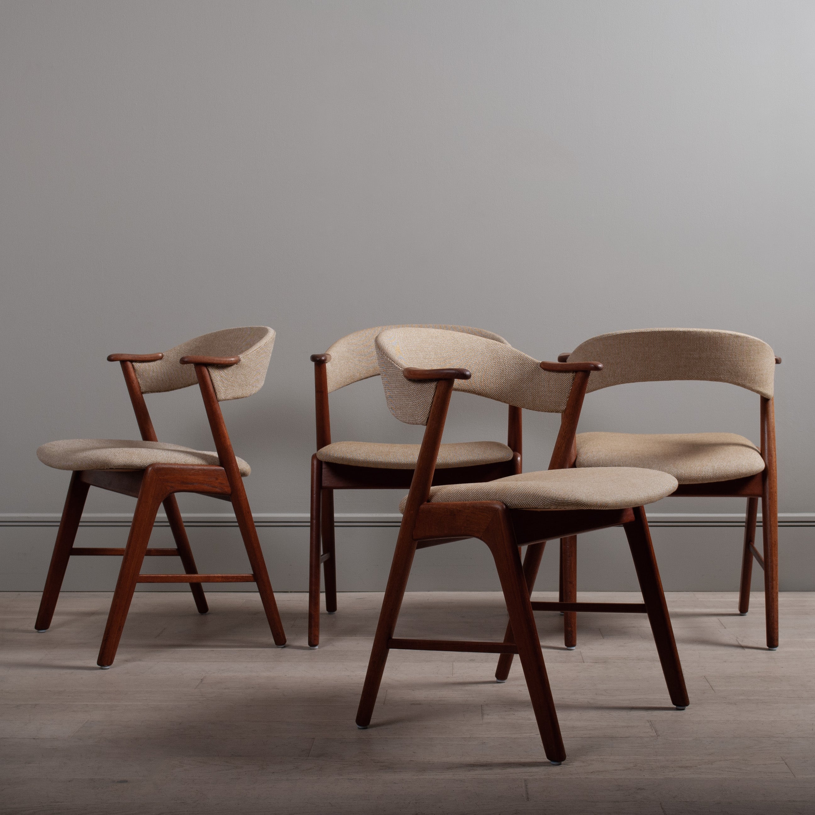 A superb set of four Modernist dining chairs by Korup Stolefabrik. Produced in Denmark in the early 1960's. A great example of European modernist design. Teak frames with perfect little armrests. Hallingdal fabric.

