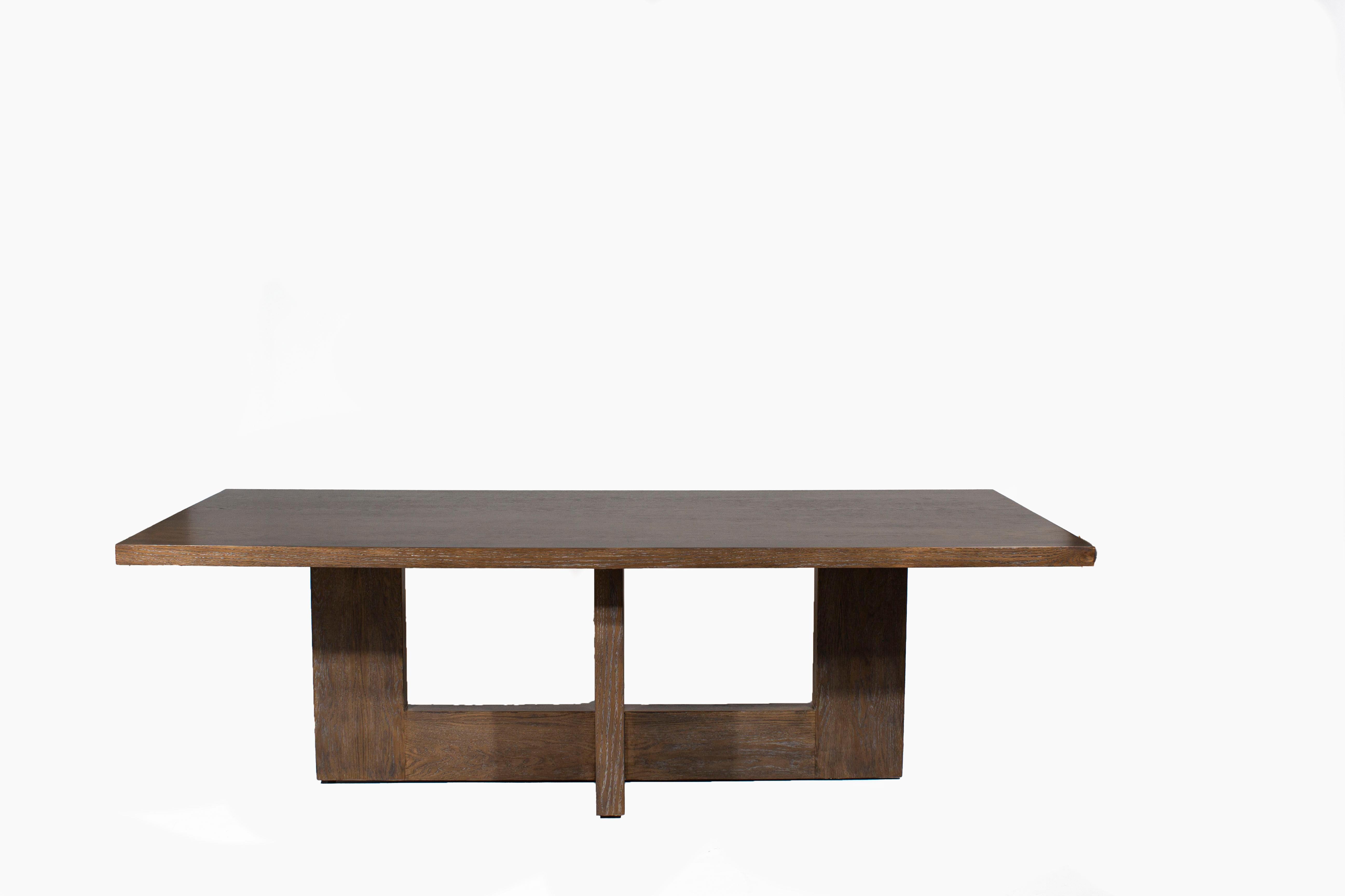 Modernist inspired dining table red oak

Designed by Brendan Bass and crafted by local artisans in the Dallas Design District.

Modern wood dining room table with geometric base.