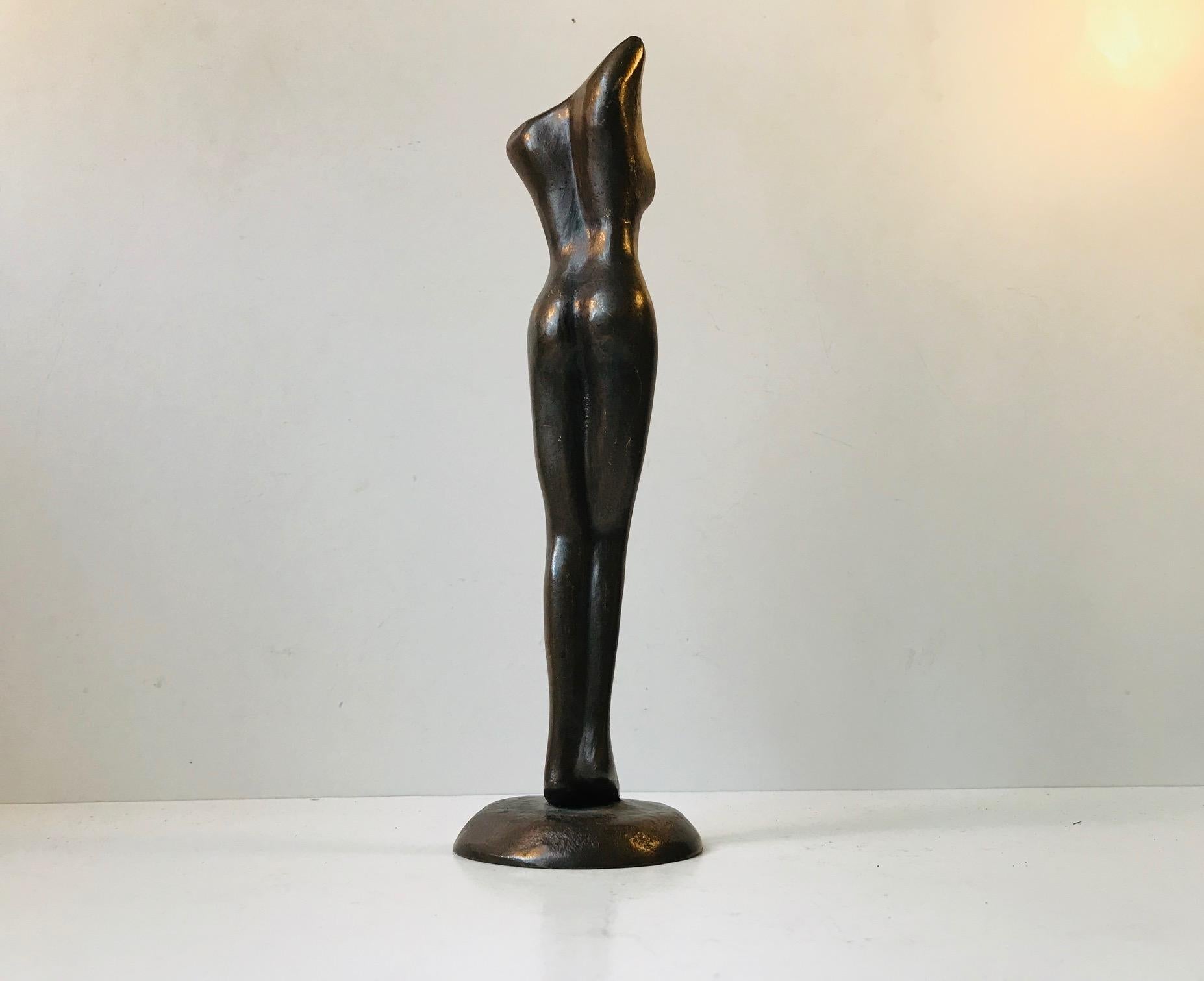 Partially Distorted female bronze sculpture with dark patina. Anonymous Scandinavian artist/sculptor, circa 1970. This piece is not signed.