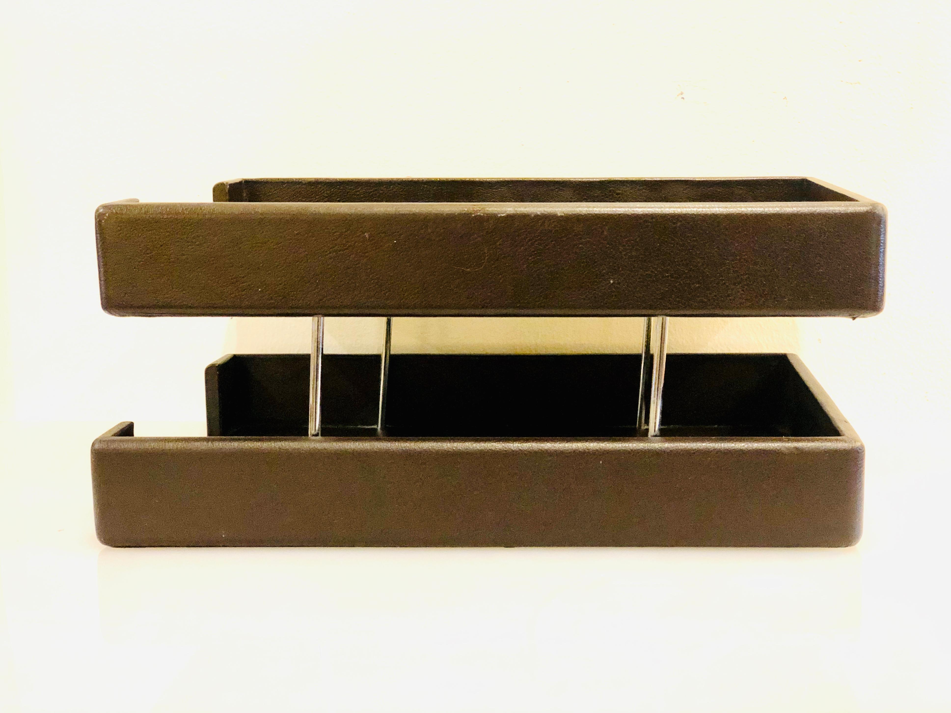 Double paper tray by Smokador distributed by Knoll in leather wrap with chrome accents, circa 1970s.
