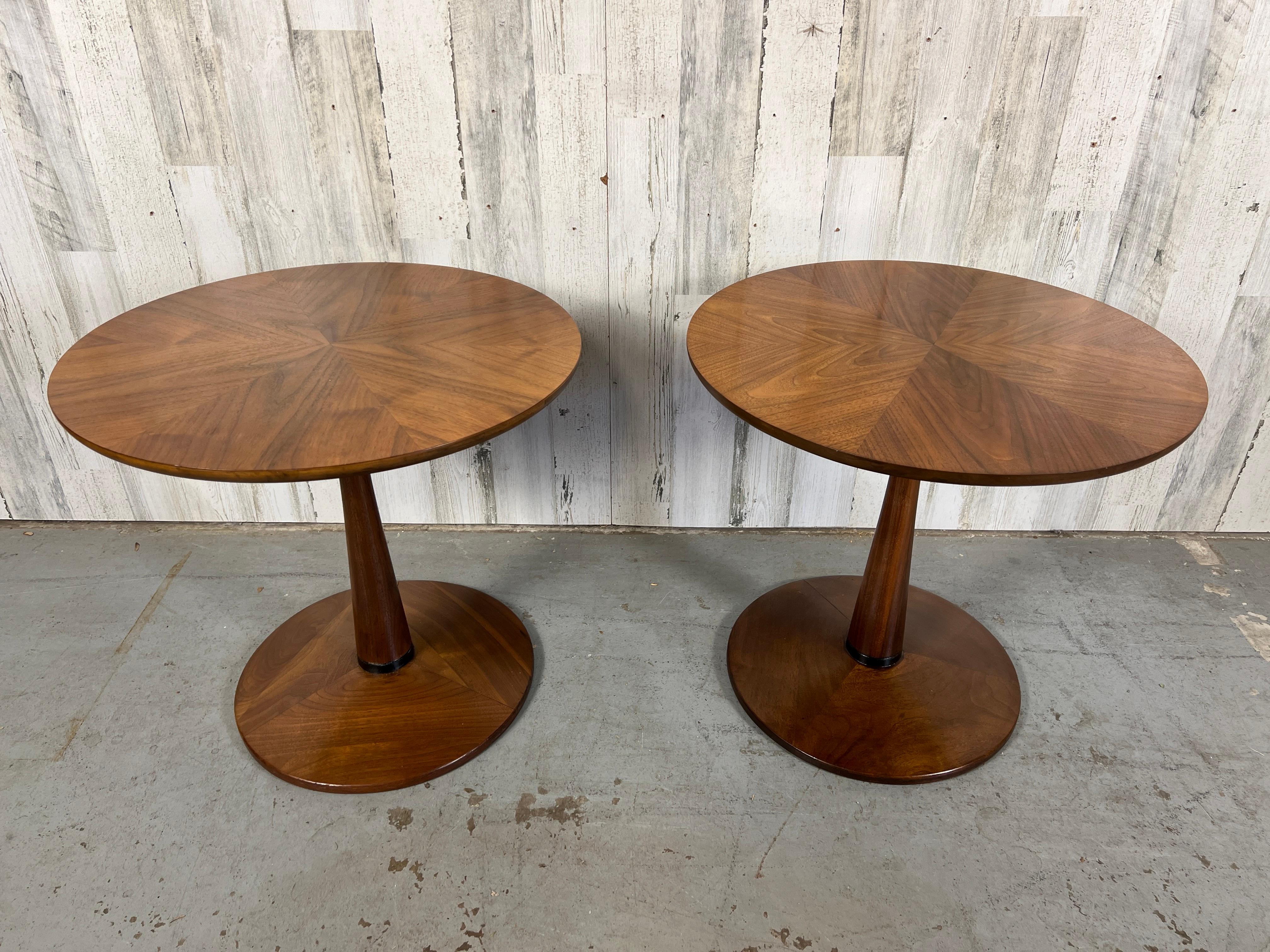 Hard to find a pair of these Drexel side tables .
Pie cut design veneer on the table tops with solid walnut bases.