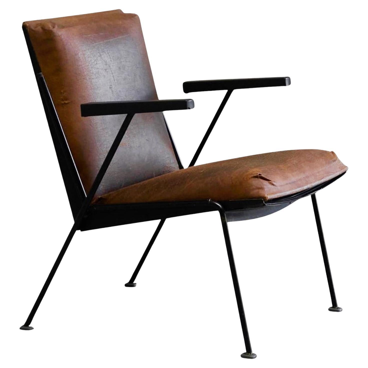 Sedia da salotto olandese modernista in acciaio smaltato e pelle marrone patinata anni
50