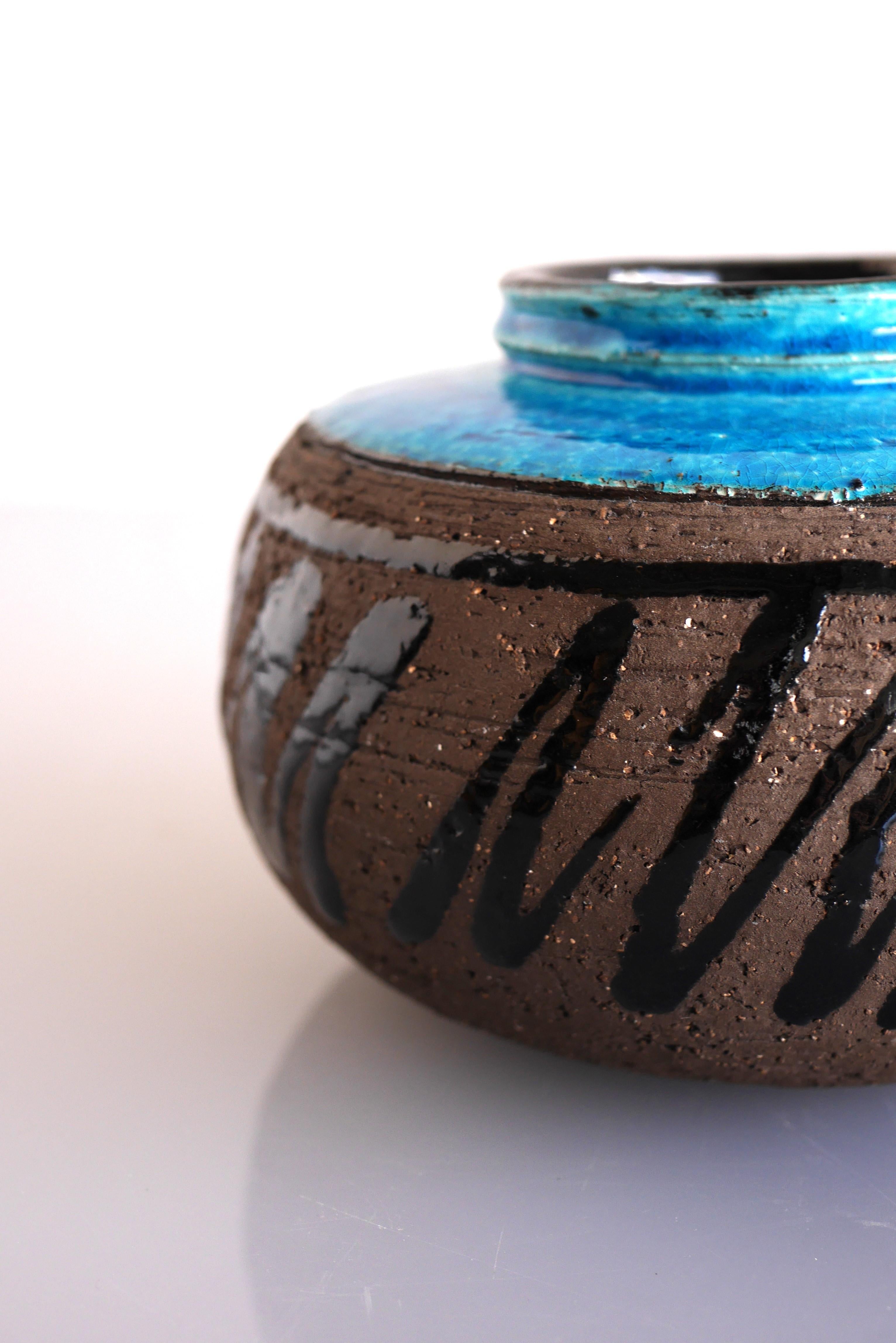 A stunning very rare and signed vintage studio production art ceramic vase by Inger Persson for Rörstrand, Sweden. This is a studio production, thus rare, with a fantastic shape and glazing. As always, her work is simple and clean, yet so effectful,