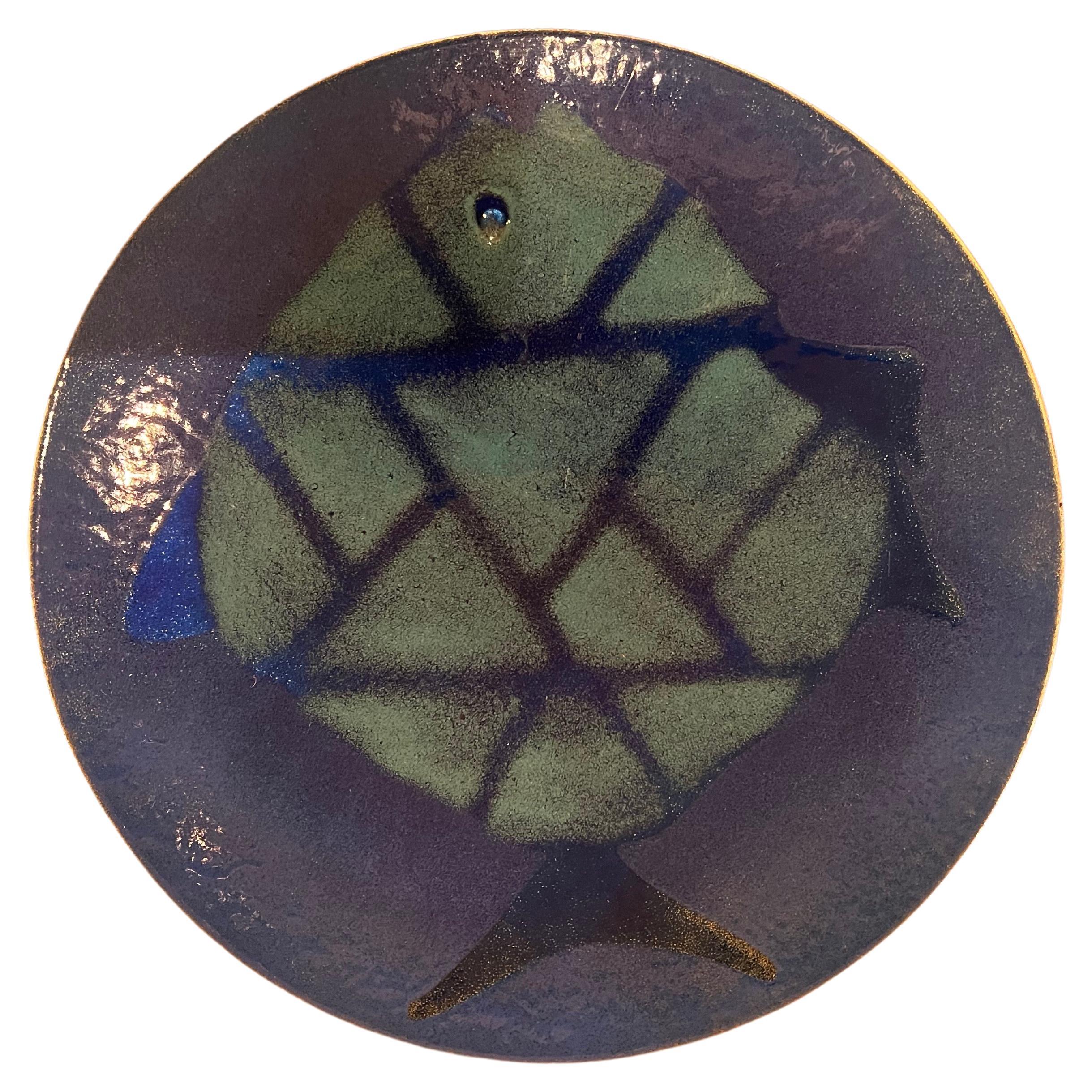 Beautiful enameled on copper bowl plate with nice blue tones colors , and beautiful fish design in excellent condition , no chips or cracks great for any mid century , Danish modern home decor.
