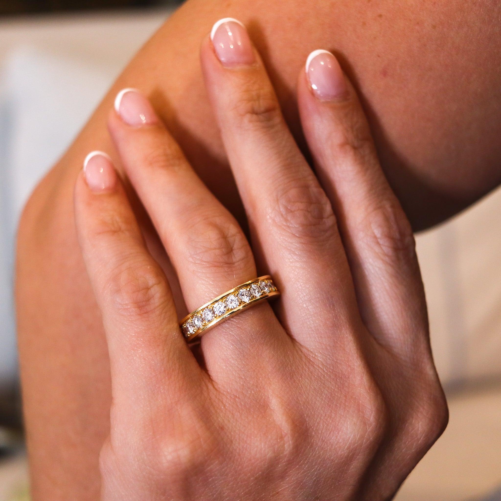 An eternity ring band with Natural diamonds

Modern eternity band ring crafted with squared shape in solid yellow gold of 18 karats yellow gold, with high polished finish. The ring is designed with a bold and thick solid look and embellished in a