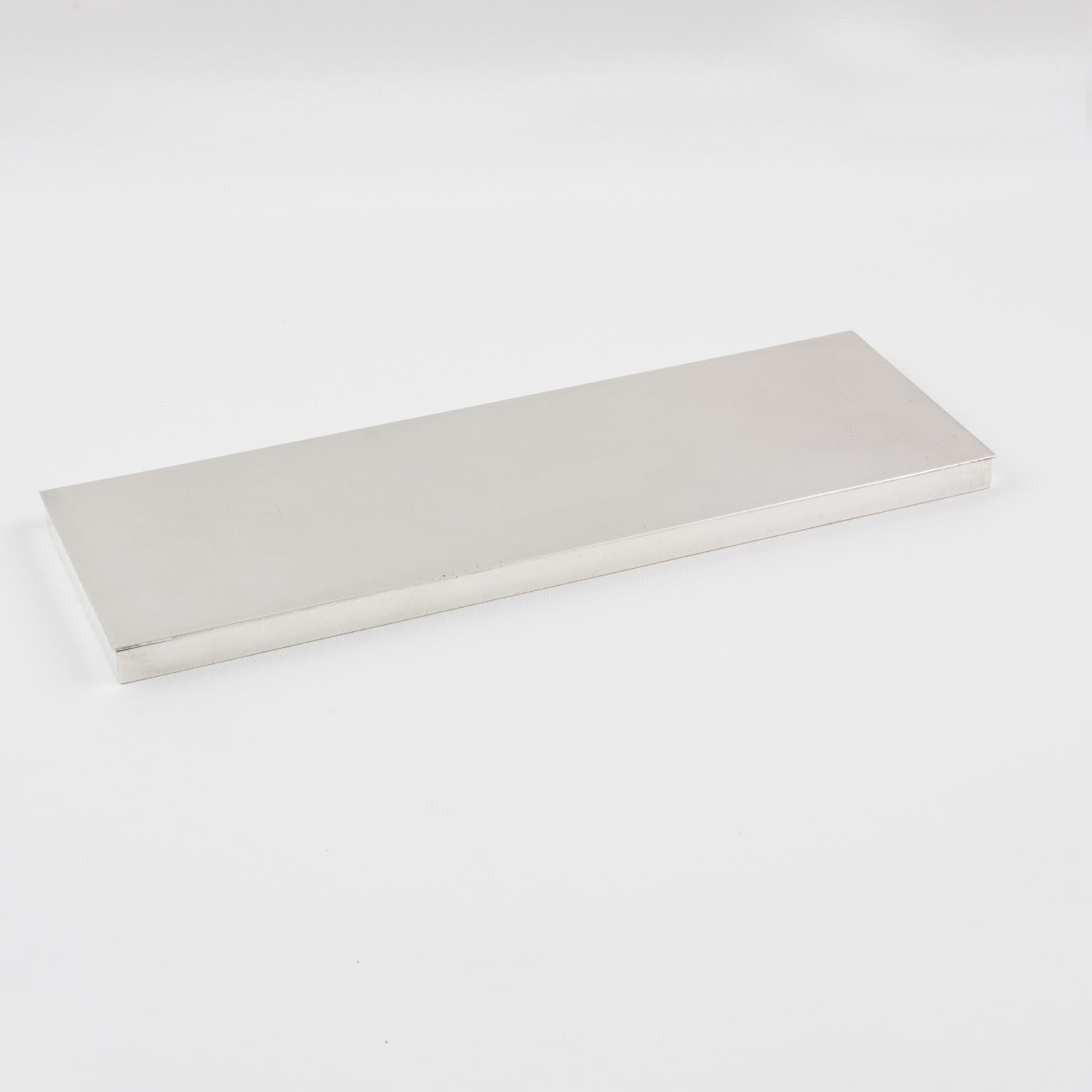 This beautiful French modernist box was crafted in the 1960s and made of silver plate metal. The minimalist and streamlined design features an extra-long and flat shape, making it an excellent choice for a business card holder on a desk or even as a